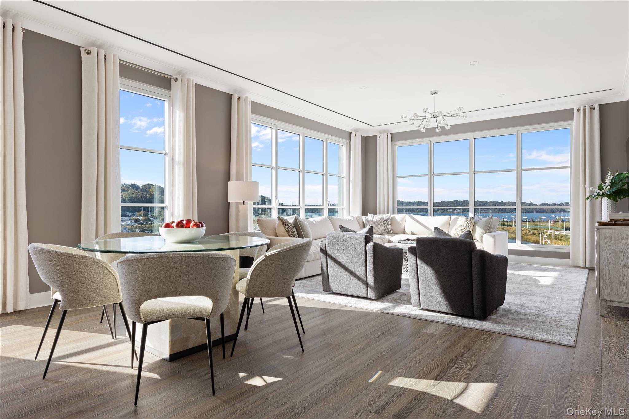 GLEN COVE. Luxury living at its finest, within the Beacon at Garvies Point; nestled on 56 acres of waterfront, residence 1324, is an exquisite 3 bedroom, 3 full bathroom home. The open gourmet kitchen has white Brazilian quartzite countertops and a kitchen island with a Kohler under-mount sink, Sharp easy touch drawer style microwave and Insinkerator garbage disposal. A GE Monogram 6 burner gas range is equipped with dual infrared cooking and is fully vented. The spacious primary king-sized bedroom features an en-suite 5-fixture master bathroom with white marble floors, countertops and full height porcelain tiled walls, a soaking tub and glass enclosed shower and a double vanity with all Kohler fixtures. This home is an entertainer's dream with a private patio as well as all the amenities and comfort the Beacon has to offer; paths, courts, marinas, beaches, dog parks, and much more!