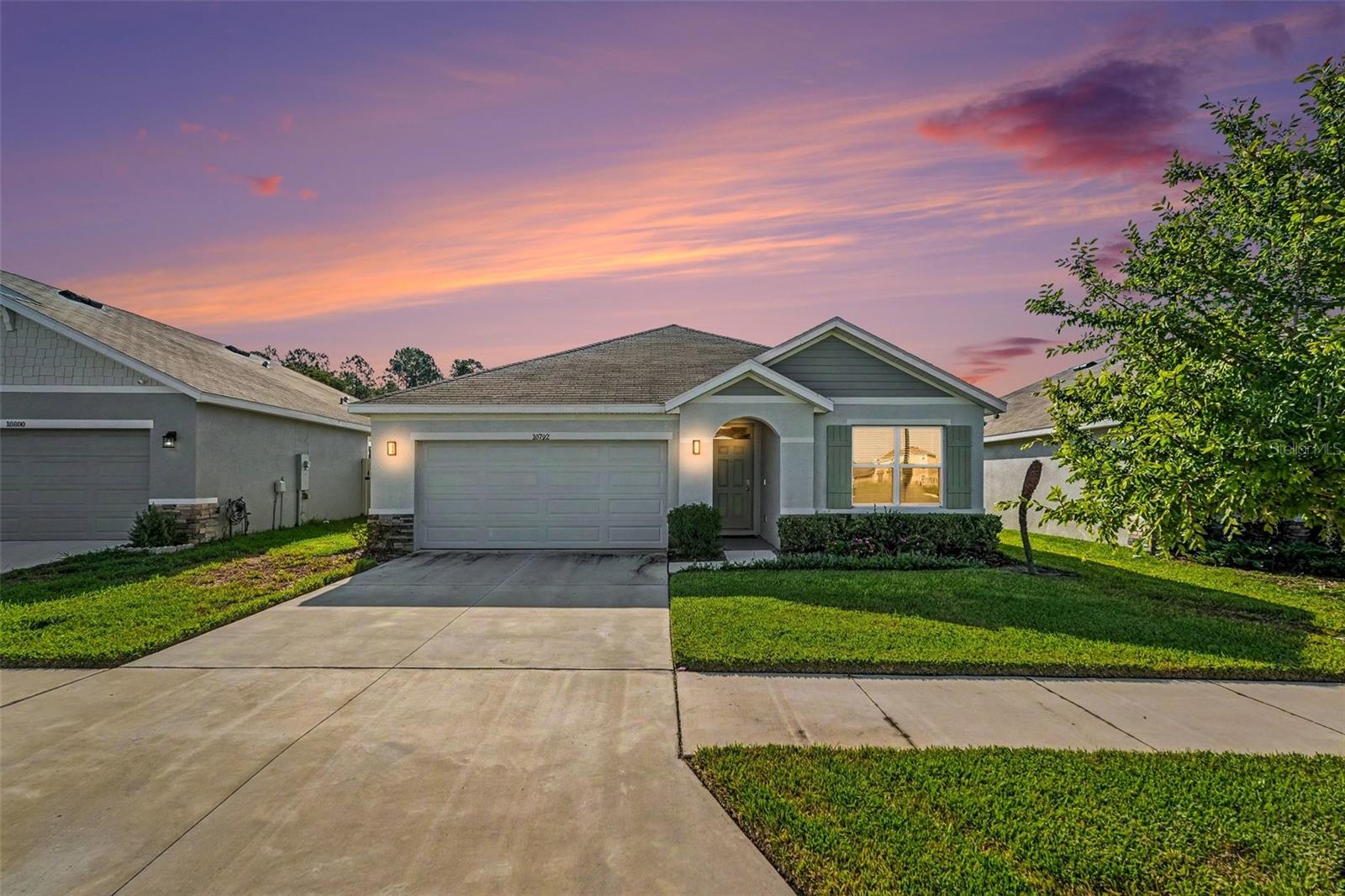 Welcome to this beautifully maintained 3-bedroom, 2-bathroom home located in the desirable Mirada Community in San Antonio, Florida. Built in 2024, this DR Horton Aria floor plan offers an open-concept layout designed for comfortable everyday living and entertaining. The modern kitchen features stainless steel appliances, ample cabinet space, and a large island overlooking the living and dining areas. The spacious primary suite includes a walk-in closet and an en-suite bathroom with dual sinks, while two additional bedrooms provide flexibility for family, guests, or a home office. This move-in-ready home has been exceptionally well maintained and offers a functional layout with contemporary finishes throughout. Enjoy everything Mirada, including the Crystal Lagoon, resort-style amenities, walking trails, parks, playgrounds, and golf cart-friendly streets, with convenient access to shopping, dining, hospitals, and major highways. Schedule your private showing today!
