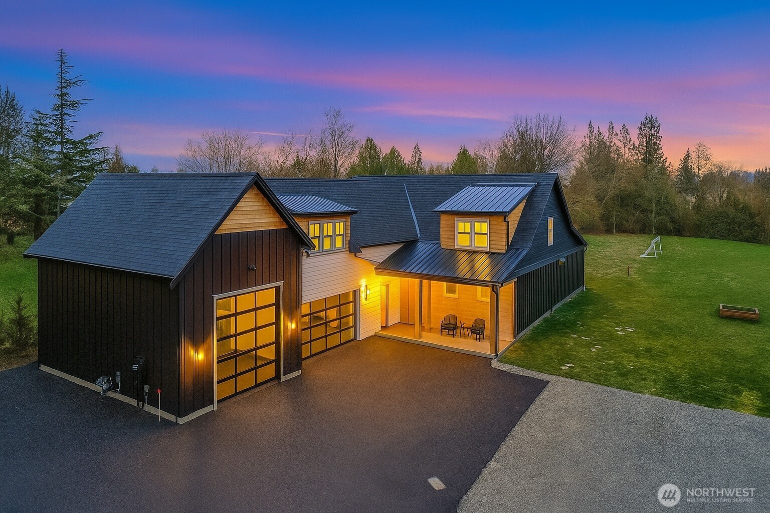 Experience refined smart home living in this exceptional Lynden retreat—nestled among evergreens & in town. Step inside to discover a chef’s dream kitchen true Caliber refrigerator/freezer, triple ovens, double dishwashers & hidden butler’s pantry. Living area boasts a stunning glass-enclosed, UL-certified wine fridge. Main-floor primary suite is pure indulgence with a steam shower & in closet private laundry. Remote operated privacy glass opens to an outdoor kitchen including double grills & spacious yard bordering scenic walking trails. The oversized RV bay offers versatility—perfect for gym, batting cages, or indoor hoops. Thoughtful built green design & quiet surroundings create a one-of-a-kind haven walking distance from down town!