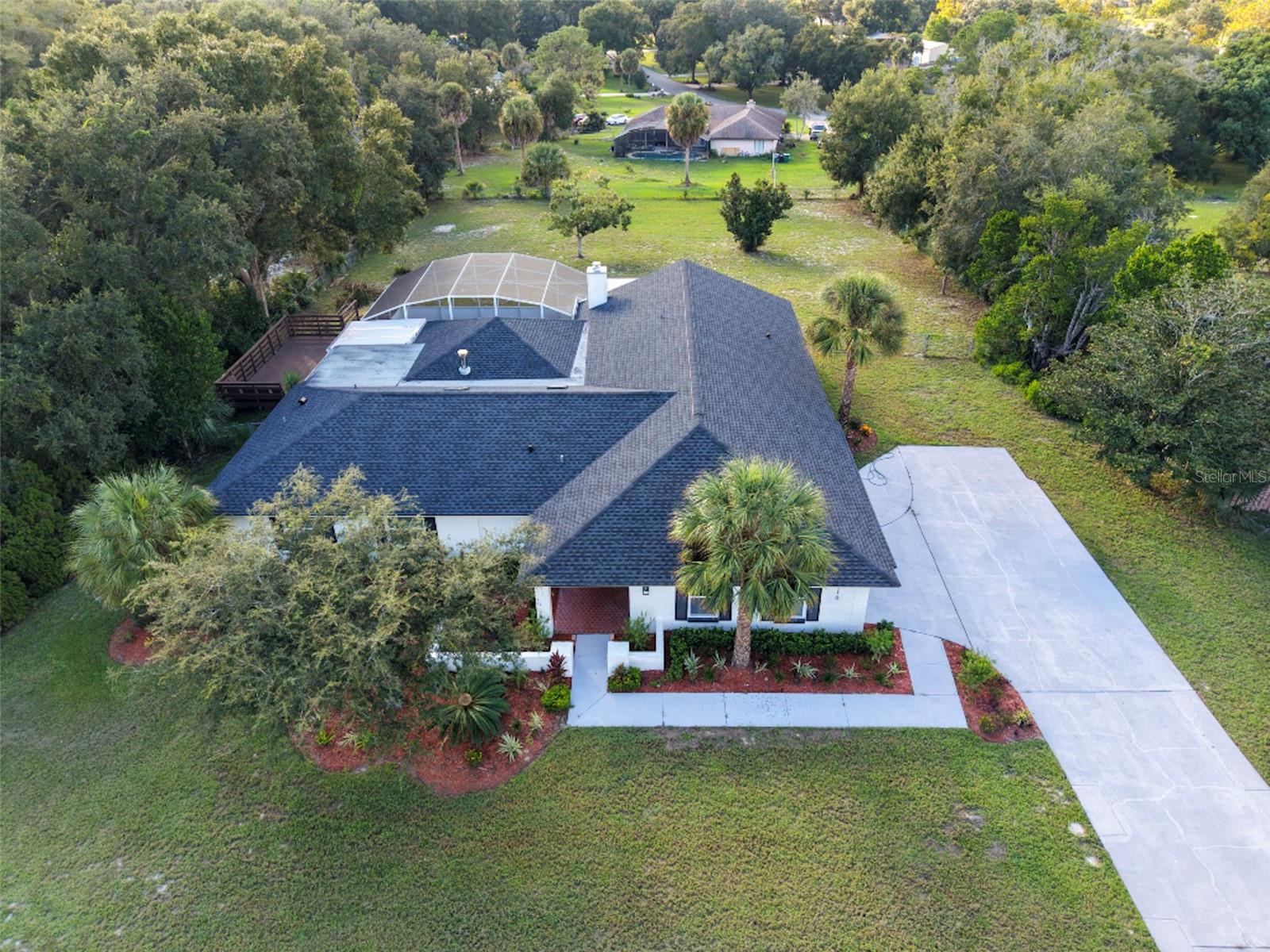 Fully renovated in 2026 and move-in ready house in the Mandarin Estates located off Markham Woods. This home offers turnkey living with all the major updates already complete. Highlights include TWO full kitchen remodels with quartz counters, cabinets, and stainless steel appliances, new LVP and tile flooring throughout, and fully remodeled bathrooms. Outdoor living centers on a newly resurfaced pool and deck along with a pool bar. A new roof, Lennox AC unit, windows, mini-split system, LG washer and dryer, fresh interior and exterior paint, and newly installed ceiling fans and light fixtures round out the renovation. A polished, low-maintenance home ready for its next owners. Schedule your showing today!