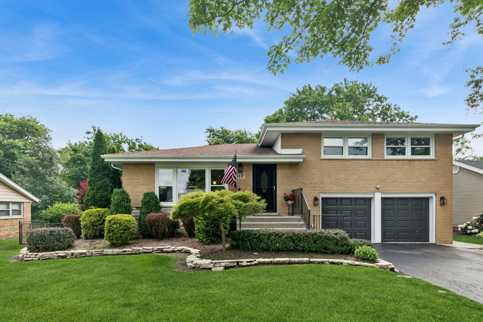 Completely transformed stunning mid century in downtown Frankfort!Full renovation just completed on this charming 3 bd/2 bath brick split level with finished basement!  Truly turn key, this home has been remodeled from floor to ceiling.  Walls removed for open concept living room/kitchen space and custom stone California electric fireplace was added. Enjoy your new stylish white kitchen with Bosch appliance package, gleaming quartz surfaces and buffet area with loads of custom cabinetry.  Both bathrooms enlarged and newly remodeled! All new flooring throughout and the 3 bedrooms all have excellent condition hardwood floors under designer carpet.  Other updates include brand new furnace and AC, custom Levolor window shades and blinds, new water softener, reverse osmosis/carbon filtration system and hot water heater just installed, plus all new designer light fixtures.  Fully landscaped lot with plush vegetation make for serene and tranquil backyard get togethers and BEST OF ALL IS THE LOCATION! Walk a half block to the Trolley Barn, many restaurants, boutiques and the countless Frankfort activities such as Sunday Farmer's Market and Sunday summer concerts at the park in addition to the Fall Fest amongst many other chamber activities all withing a few steps from this charming home!