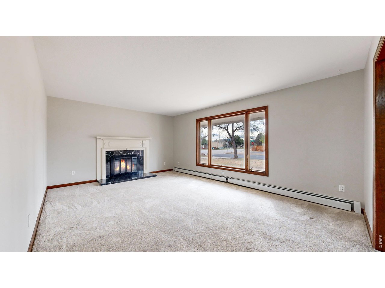 Here is your chance to purchase a rare diamond in the rough and make it the true gem you desire. This sprawling ranch style home features a large 0.4 acre lot in a premier Fort Collins neighborhood within biking distance to EPIC Pool and Ice Center, Edora Park along with the Spring Creek and Poudre bike trails. As you enter, you'll appreciate the cozy living room with wood burning fireplace. The primary bedroom features an en-suite bathroom and walk-in closet and is conveniently located on the main floor along with two additional bedrooms and another full bathroom. The charming kitchen features granite countertops, stainless-steel appliances and original cabinets. Passing through the kitchen is a large bonus room perfect for game nights. The finished basement is highlighted with an additional living room, three additional bedrooms and full bathroom. Heading outside you'll enjoy the large backyard with a spacious covered porch and mature trees. An added bonus for this property is the detached heated garage/workshop perfect for hobby projects, a gym, an office or an at-home business. This convenient location is just a short drive to your favorite destinations like Old Town Fort Collins, CSU and Horsetooth Reservoir. With no HOA you can bring your boats or toys and have room to spare! If you have vision, this place can be your dream!