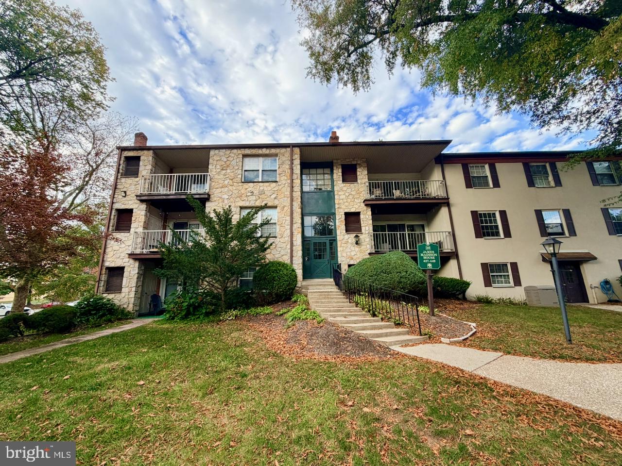 Off the beaten path, yet close to so much! Welcome to Glenhardie, a beautifully maintained condominium community in Wayne, PA, surrounded by mature trees, landscaped grounds, and walking paths. Located within the Tredyffrin-Easttown School District, Glenhardie combines natural beauty with everyday convenience. This updated third-floor condo offers peaceful wooded views, generous storage, and a flexible floor plan. A second room with the potential to serve as an additional bedroom sets this condo apart from many others in the community. Enjoy the comfort and convenience of low-maintenance condominium living in a beautiful, natural setting.Enter through the secure building entrance and make your way to an inviting home with attractive wood-look vinyl plank flooring throughout. The updated kitchen features white cabinetry, a five-burner gas range, a large stainless steel refrigerator, and plentiful cabinet and counter space. A pass-through keeps the kitchen connected to the living area, while the adjoining dining room offers room for a table seating eight. Gather for dinner, then settle into the comfortable living room for conversation, a movie, or a good book.A closet-lined hallway leads to the spacious primary bedroom, where wooded views create a restful backdrop. There is room for all your bedroom furniture and even a desk or home office workspace, while the large hallway closets provide abundant storage, complemented by an additional dedicated storage unit. The bathroom is beautifully updated with an attractive vanity and flooring, a tiled shower, and LED lighting.One of this home's standout features is its versatile second room, spacious enough for a large bed, with options for a guest room, home office, den, or separate sitting area. Sliding glass doors lead to the private balcony, an inviting spot for morning coffee, watching nature, or unwinding at the end of the day. Enjoy the elevated outlook over the wooded grounds and the changing seasons.Everyday conveniences include a same-floor laundry area with a coin-operated washer and dryer, along with access to trash disposal and recycling. Professional on-site management and condominium fees covering exterior building and common-area maintenance, lawn care, snow removal, trash, water, and sewer help simplify homeownership, making this an appealing option for anyone seeking a low-maintenance, lock-and-leave lifestyle.For additional recreation, residents may obtain a discounted rate on optional membership at Glenhardie Country Club, offering a nine-hole executive golf course, swimming, tennis, pickleball, and indoor and outdoor dining. Club membership is separate from the condominium association and available for an additional fee.Beyond the community, explore the trails of nearby Valley Forge National Historical Park, shop and dine at King of Prussia Mall and Town Center, or enjoy everyday conveniences including Trader Joe's, Costco, Wegmans, and Gateway Shopping Center. Glenhardie also offers convenient access to Routes 202 and 422, I-76 and I-276, and nearby Wayne and Devon rail stations, making commuting, travel, and everyday outings convenient.Whether you're seeking a comfortable primary residence, flexible work-from-home space, or an easy-to-maintain retreat to return to after traveling, this updated Glenhardie condo combines comfort, versatility, and peaceful surroundings with an exceptionally convenient Wayne location. Schedule your showing today!All measurements, including square footage, are approximate and not guaranteed. Buyers should independently verify any measurements important to their purchase.