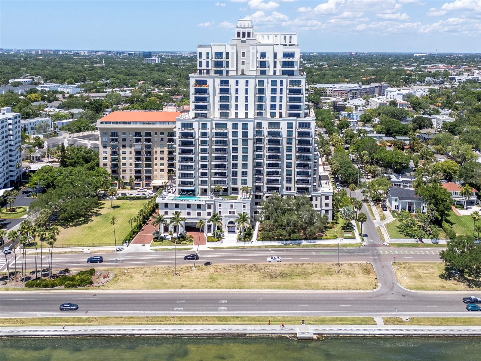 Hyde Park House condominium Located on beautiful Bayshore Blvd, this building offers stunning views of the bay while uniquely having a Hyde Park address. This 22-story building with 70 residences offers a more intimate approach to condo living. This 2 bed, 2.5 bath residence that offers a 339 sqft curved terrace with glass railings. Features include 10’ ceilings and a 48' of continuous floor ceiling glass windows with custom automatic draperies. Both bedrooms offer ensuite bathrooms with dual European-style vanities and spacious walk-in closets. A large laundry room is conveniently located off of entry foyer. High-end finishes include neutral porcelain tile flooring throughout, European cabinetry, Quartz countertops, chef’s kitchens with Gaggenau appliances, gas cooktop and front-load Electrolux washers & dryers. Building amenities include a 5th floor resort style pool and spa overlooking the ocean, covered outdoor kitchen w/ gas grill, gas fire pits, beautiful community living room and large fitness center. Other building features include secured parking garage, entry to building and elevators, climate-controlled storage, and 24/7 concierge. Hyde Park House's location is truly special, within walking distance of Hyde Park village, howard Ave Bayshore boulevard ' 7-mile side walkalong the water and more.