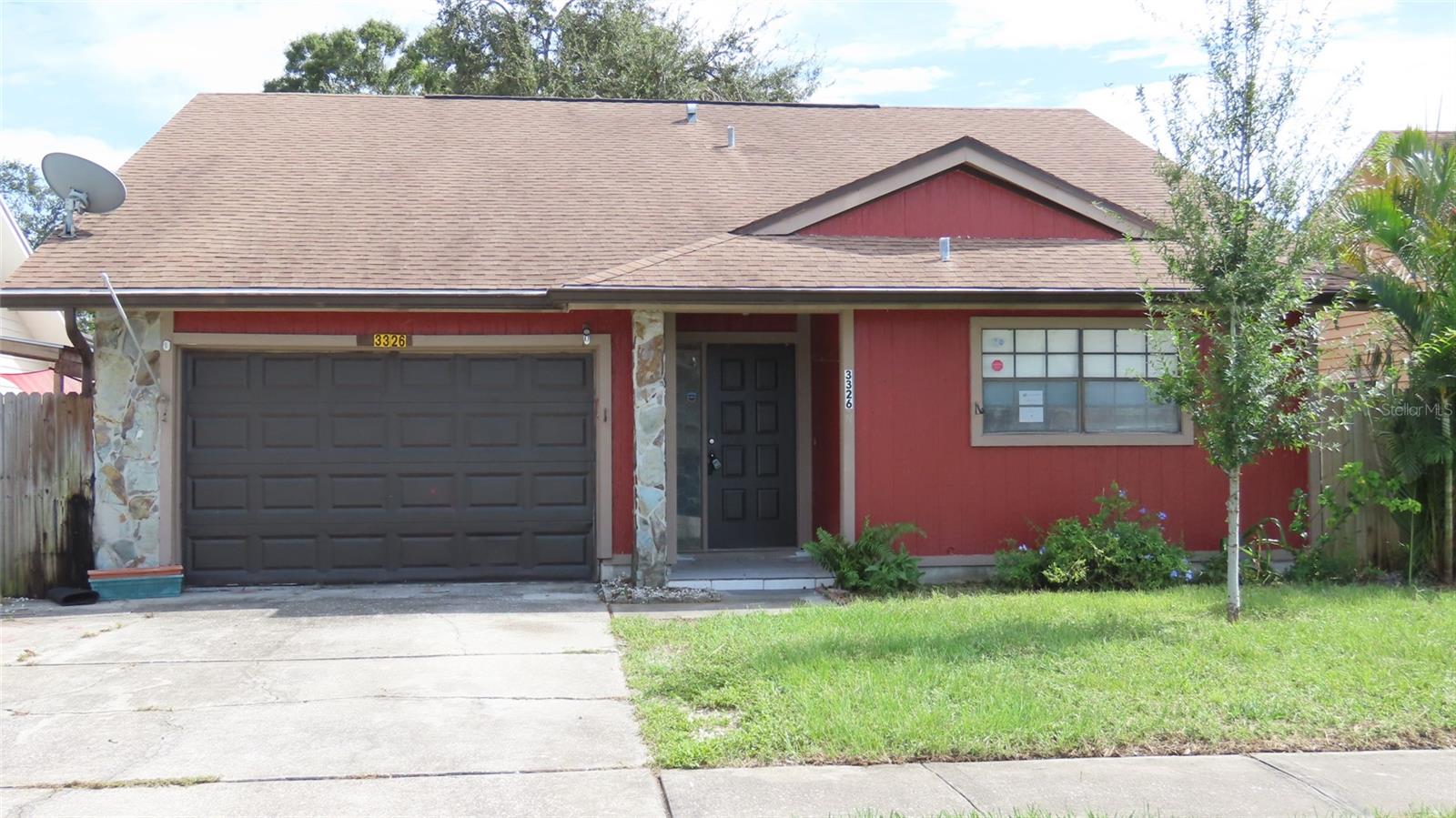***Multiple offers - highest and best is due by 2 p.m. Thursday 8/27***. Welcome to 3326 Whispering Drive N - a home offering a flexible 3-bedroom, 2-bath layout with an oversized one-car garage, multiple outdoor living areas, and an opportunity to update the home to reflect your own style. The interior features a spacious kitchen with an eating area and ample room to reconfigure or modernize over time. The combined living and dining area provides a practical central gathering space, while the bedrooms offer several options for sleeping accommodations, a home office, hobbies, or guests.Outdoor spaces include a covered side patio accessible from the living area and an enclosed rear patio located off one of the guest bedrooms. The fenced backyard occupies an irregularly shaped pond-front lot. Although the existing tall wood fence currently limits the water view, the pond-side setting offers possibilities for future landscaping or outdoor enhancements. The home also includes solar panels, an oversized one-car garage with a laundry area, and additional space for storage or projects.The property is conveniently located near shopping, restaurants, everyday services, Largo Central Park, Eagle Lake Park, the Central Park Performing Arts Center, and the Largo Community Center. Gulf beaches, St. Pete–Clearwater International Airport, Downtown Clearwater, and major roadways connecting to Downtown St. Petersburg and Tampa are also within convenient reach. The home is livable in its current condition but is dated and would benefit from updating, making it an appealing opportunity for a buyer ready to personalize the property and build upon its existing features. Solar-panel condition and system performance are unknown and should be independently verified by the buyer.  All information is believed to be accurate but is not guaranteed. Buyers and agents should verify all facts and information pertinent to their purchase decision.