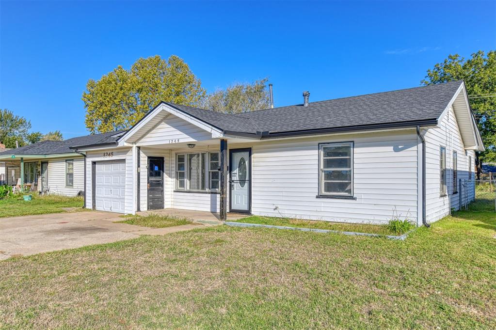 Charming central Norman home with modern updates just minutes away from local dining, shopping, and parks.  The vinyl siding on the exterior means no need for routine painting. From the moment you step inside you will notice the seamless wood-look tile that stretches throughout the house offering a modern aesthetic and effortless maintenance. 3 nice size bedrooms. One is so large that you'll be tempted to use it as a second living area! Stay comfortable year-round enjoying the new heating and air unit that was installed in August of 2025. It's also nice to know that the roof was replaced in 2021. The convenient 1-car garage provides extra parking, additional storage, or even a dedicated workspace. Whether you are looking for your first home, downsizing, or seeking an investment property, this home is close to everything Norman has to offer. Finding a home like this in Norman under $150,000 is truly a rare opportunity.