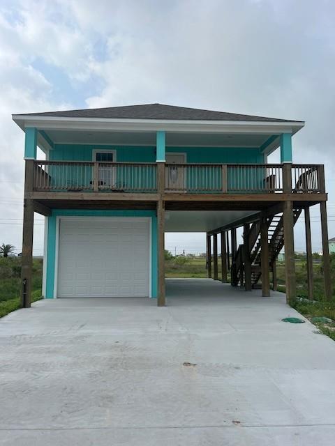 Check out this fabulous new construction 3/2 stilt home with a BOAT GARAGE in the desirable Holiday Beach area!  This home has an open floor plan, a large upper deck with a water view, an upstairs laundry room, a large master closet, and plenty of space under the home for relaxing outdoors.  This is one of the few homes in the area with a boat garage-measurements per seller are 15x40 garage with 10'6"x12 door-boat garage added in Decemeber 2024.  Many upgrades including laminate wood look floors, tile backsplash, & granite counters.  The Holiday Beach Subdivision has a community pool, pier, and boat ramps.  You will be within minutes of the Rockport Beach and local shops and restaurants.  This would make a wonderful getaway, investment property, or permanent home.  Short and long term rentals allowed.  Schedule a tour today!