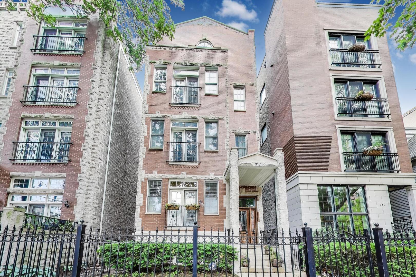 WELCOME HOME!    TOTAL RENOVATION + an INCREDIBLY UNIQUE floorplan in the heart of Lincoln Park! 917 W. Altgeld combines size (2,563 sf), functionality, turnkey finishes, and a prime location-truly a rare gem waiting for its lucky new owner.    Step inside from quiet, tree-lined Altgeld Street and immediately notice the charm and warmth of your wood burning fireplace amidst hardwood floors, newer light fixtures, and plantation shutters throughout. The first-floor family room offers flexible space for both entertaining and hosting larger dinner parties.    The gut-renovated kitchen (2021) will make you fall in love-new cabinetry, counters, backsplash, and appliances flow seamlessly into the open living space. Unlike most layouts, both bedrooms are conveniently on the main floor, including a spacious second bedroom with a full renovated bath (2019), plus a beautiful primary suite with dual closets and a luxurious en suite (2023) featuring heated floors and a steam shower with dual rain heads.    Head downstairs for even more wow factors: a custom office nook (2023), brand-new carpet (2022), and an entertainer's dream space with surround sound, oversized seating, and a renovated wet bar with wine fridge + ice maker. The lower level also includes 2 additional bedrooms and a full bath-bringing the total to 4 bedrooms + office and 3 full baths in this one-of-a-kind home.    Outdoor living is just as impressive with a private garage rooftop deck-perfect for summer nights, gardening, or creating a play space. Additional perks include abundant storage, newer furnace + water heater (2022), and true move-in-ready finishes.    All this in the Oscar Mayer school district, just one mile from the lakefront, steps to the Fullerton L, and surrounded by Lincoln Park's endless restaurants, bars, and shopping.    Schedule your showing today and see how this remarkable property can become your dream home!