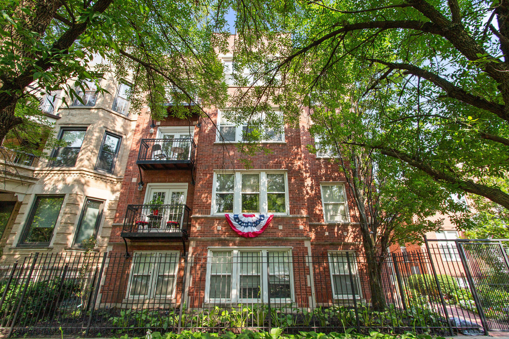 Experience the Best of City Living in this Beautifully Designed Two Bedroom / One Bathroom Penthouse Condo, perfectly situated on a Quiet, Tree-Lined, One-Way Street in Ravenswood. This Top Floor Gem offers Soaring Ten Foot Ceilings, Abundant Natural Light, and an Open Floor Plan that feels both Spacious and Inviting. Hardwood Floors flow from the Living Room into the Chef's Kitchen that's sure to impress with its 42" Cabinets, Stainless Steel Appliances, and Gorgeous Quartzite Peninsula with a Breakfast Bar that comfortably seats Five-perfect for Casual Dining or Entertaining Guests. Both Bedrooms offer Generous Space and Ample Closet Storage, and there is Full Bathroom off the Hall. The Condo is equipped with a Full-sized, In-unit Washer and Dryer, New Central Heat and Air (2024), there is Additional On-site 4' x 6' Storage Unit in the Building for all your "extras" and this Unit has Roof Rights.  This Prime Location is Moments to: Brown Line, Ravenswood Train Station, Mariano's, Jewel-Osco, Lakefront Trail, Montrose Beach and Dog Park, Restaurants, Coffee Shops, Shopping, Nightlife and More.