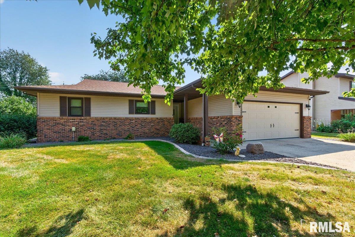 You are going to love this extremely well maintained 3 bedroom 2 bath ranch home located in Hunting Meadows subdivision in Springfield but in the Chatham School district. You will enjoy the craftsmanship in the warm natural wood crown moulding, hardwood floors, natural woodwork and doors, the cathedral ceiliing and the wood burning fireplace in the spacious living room.  The extra large kitchen (which comes with all of the major appliances) has solid surface countertops and an ample supply of cabinets. Enjoy the beautiful nature view from your back deck because you do not have any neighbors (besides the deer and other wildlife) that live behind you.  Other notable features include: A new roof in 2024, 6" insulated exterior walls, updated windows, doors, insulated crawl space, and an insulated garage door for greater energy efficiency.