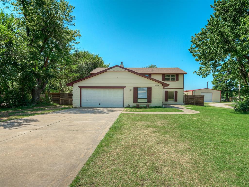 Welcome to a beautifully maintained two-story home that offers space, charm, and functionality. Featuring multiple living areas, two fireplaces, and updated flooring throughout the main level, this home blends character with modern comfort. The kitchen is complete with rich cabinetry, double ovens, and plenty of prep space—ideal for both everyday meals and entertaining.