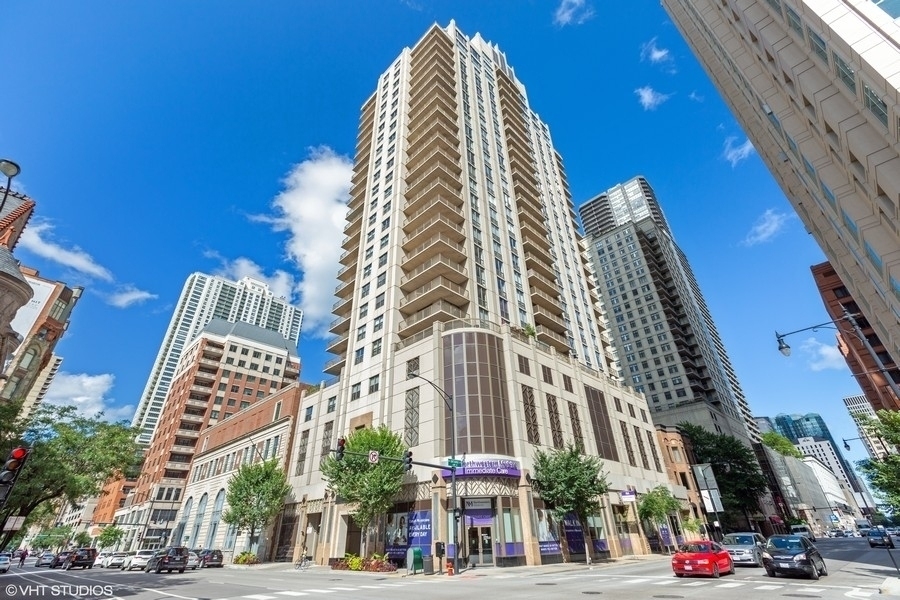 High floor, River North 2BR/2BA condo on the Northwest corner located at the Caravel. Unit features floor-to-ceiling windows, wrap-around balcony and a great views of the city. This floorplan is great for entertaining with a split bedroom floorplan and spacious separate dining area. Kitchen has granite counters & maple cabinets. The unit also has new premium, wide plank,vinyl floors and new carpet in the bedrooms. The spacious primary bedroom fits a King bed. The primary bathroom has a double vanity, Jacuzzi tub, separate shower, and marble tile. Home features good closet space and in-unit laundry. Building is walking distance to grocery stores (Whole Foods, Trader Joes and Jewel are blocks away), restaurants, & shopping. Easy walk to CTA Red Line at Grand Avenue. Pets under 25 lbs welcome with a 2 pet limit. Building amenities include a newer fitness center, 24 door person, & newly renovated guest suite. Deeded garage parking spot #57 available for purchase. Storage locker included. Financially sound building with long time building manager & staff.
