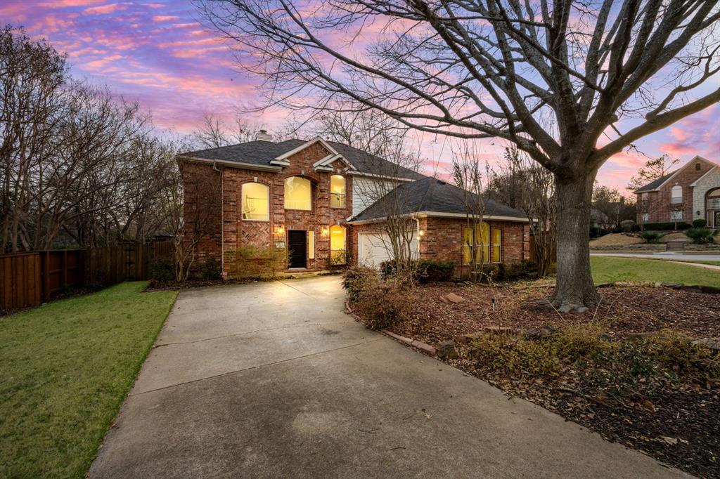 Come see this beautifully updated north-facing 3-bedroom, 2.5-bath, two-story home on a premium corner lot in highly desirable Watters Crossing in Allen. One of the largest lots in the neighborhood, this home offers exceptional outdoor space and an unbeatable location within walking distance to Watters Creek Village, scenic mile-long walk and bike trails along Watters Creek, and quick access to U.S. Route 75 and Sam Rayburn Tollway for an easy commute. The welcoming entry opens to a light-filled floor plan featuring updated lighting, warm wood flooring, and a seamless flow designed for everyday living and entertaining. The gourmet kitchen shines with quartz countertops, stainless steel appliances, and a breakfast bar that opens to the dining and living areas — perfect for gatherings. The main level includes a bright living room with large windows and a cozy see-through fireplace shared with a private office or flex space. Upstairs, you’ll find three spacious bedrooms, including a relaxing primary suite with a beautifully updated en-suite bath featuring dual vanities, a soaking tub, frameless glass shower, and a large walk-in closet. Enjoy brand-new hardwood floors throughout the upstairs and flex space — with no carpet anywhere in the home — offering a clean, modern, and low-maintenance lifestyle. Step outside to a wonderful deck overlooking the expansive private backyard, complete with a fire pit area, gazebo, and landscaped dry creek bed, creating the perfect setting for entertaining or relaxing. Community amenities include two pools, with one just a short two-minute walk away. Move-in ready and perfectly located, this home offers comfort, style, and convenience all in one.