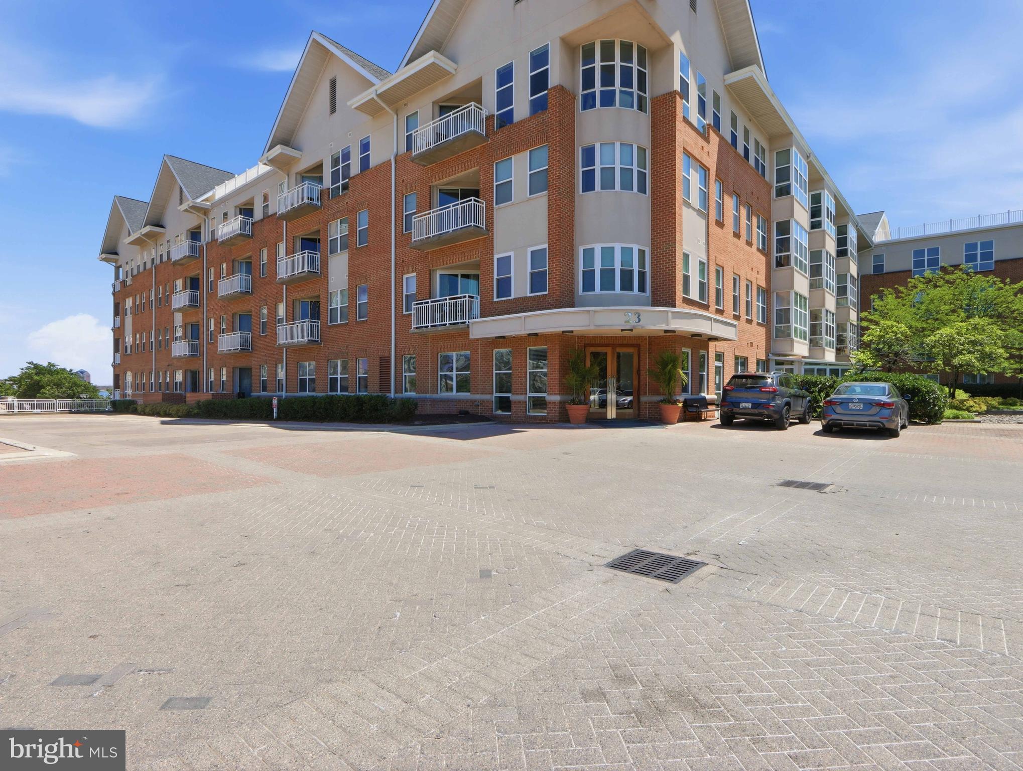 Welcome to Harborview at 23 Pierside Drive, Unit 119.  Rarely available first floor condominium offering comfort, convenience, and the sought after Harborview lifestyle.  This bright and inviting one bedroom, one bath residence features elegant moldings, abundant natural light, in unit washer & dryer, and a versatile sunroom that could easily transform into an in home office, den, reading nook or additional living space.  A unique highlight is that it has a door with access to the outside providing easy access and a touch out outdoor enjoyment.  Located just steps from the main lobby and front reception desk, this unit offers exceptional convenience within the community.  Residents enjoy Harborview's outstanding amenities, including fitness facilities, swimming pool, beautifully landscaped grounds, concierge service, 24 hour private security, shops, dining, and a vibrant waterfront lifestyle of Baltimore's Inner Harbor.  Reserved secured private reserved parking space P1-244 Conveys with the unit.  Don't miss this opportunity to enjoy low maintenance living in one of Baltimore's premiere waterfront communities, with easy access to downtown attractions, restaurants, entertainment, and scenic harbor promenades.  Start living the Harborview lifestyle today.
