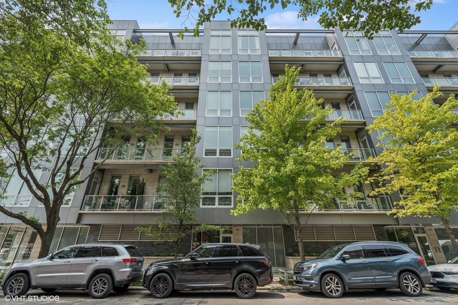 Step off your private elevator and inside this serene and chic, fully upgraded 3 bedroom / 3 bathroom condo in the heart of the West Loop. Developed by the renowned Belgravia Group with nearly 2,000 square feet of living space, this unit features 11 ft ceilings and an open floorplan, making this space an entertainer's dream. The chef's kitchen flows seamlessly into the living and dining areas and features top-of-the-line stainless steel Fisher & Paykel appliances, quartz countertops, custom two-toned Italian cabinetry, and a sleek island. The expansive living room is complete with floor to ceiling windows, skyline views, and decorative built-ins, truly making it the centerpiece of the home. Located just off of the living room is one of two private terraces. Retreat into the primary bedroom where you'll find custom floor-to-ceiling electronic drapery, an oversized walk-in closet, and a serene en-suite bathroom with double vanities and walk-in shower. The spacious second and third bedrooms provide ample closet storage, one with a en-suite bathroom and the other conveniently located next to the hall bathroom. There is also a large alcove that can be used as a mudroom, office space, or play area. An oversized laundry closet with custom built-ins, a storage unit, 2 deeded parking spots included in the price, and low assessments make this one you don't want to miss. Walk to Randolph street restaurants, Fulton Market, Mary Bartelme park, Skinner elementary, and more!