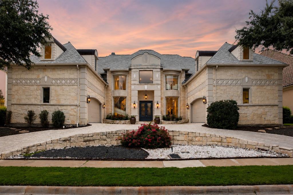 Set behind the guarded gates of The Enclave at Windsor Ridge, Las Colinas' most prestigious golf course communities, this exceptional estate commands a premier position overlooking the fairways of The Nelson Golf & Sports Club at Ritz-Carlton Las Colinas.From the moment you enter, soaring ceilings, grand living spaces, and walls of windows create an impressive first impression. The view unfolds to a resort-style pool and spa with sweeping golf course vistas beyond. Designed around its setting, the expansive living room features a statement fireplace, custom wet bar, and panoramic fairway views, creating a sophisticated atmosphere for entertaining and everyday living.The chef's kitchen is complemented by informal dining for daily living, while a separate formal dining room provides a refined setting for entertaining. The outdoor living spaces maximize the home's golf course frontage, featuring a covered patio, outdoor kitchen, pool, spa, and sweeping fairway views that create a seamless connection between indoor and outdoor living.A rare dual-primary floor plan offers exceptional flexibility for multigenerational living, long-term guests, or future planning. Both suites are luxurious private retreats featuring oversized custom closets and thoughtfully designed for comfort and privacy.Additional features include a dedicated downstairs media room, while the upper level offers a private home office and a versatile bonus room off the upstairs primary that can function as a fitness studio, hobby space, or additional flex room. Multiple balconies capture golf course views, perfect for morning coffee, evening cocktails, and breathtaking Texas sunsets.A circular drive and four-car garage complete this remarkable residence, offering a rare combination of luxury, scale, privacy, and golf course living in one of Las Colinas' most coveted communities.