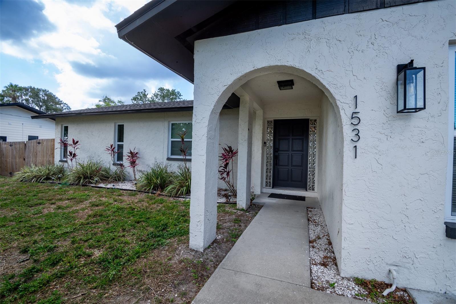 Located in unincorporated Clearwater, this beautifully updated 3-bedroom, 2-bath home offers 1,475 square feet of move-in-ready living space and the peace of mind that comes with extensive recent improvements. Situated on a fully fenced 6,000-square-foot lot with no HOA and no flood zone, this property combines modern upgrades, functional living spaces, and the Florida lifestyle buyers are looking for.Inside, you'll find a bright and welcoming floor plan filled with natural light, updated LVP flooring, and a neutral color palette that complements any décor. The renovated kitchen serves as the heart of the home, featuring elegant quartz countertops, ample cabinetry, and a full suite of stainless steel appliances that were installed approximately three years ago. The living and dining areas flow seamlessly together, creating an inviting space for both everyday living and entertaining.The spacious bedrooms offer comfort and flexibility, while the updated bathrooms provide clean, modern finishes. An oversized screened lanai extends the living space outdoors, offering the perfect setting for morning coffee, family gatherings, or relaxing evenings.Major updates completed approximately three years ago include the roof, HVAC system, water heater, windows, electrical, plumbing, and kitchen appliances—providing exceptional value and reducing future maintenance concerns for years to come. The fully fenced backyard offers privacy and room for pets, play, or gardening, while the driveway accommodates two vehicles.Conveniently located near Rt 60 and US 19, Crest Lake and Eagle Lake parks, 10 minutes from Clearwater beaches. This move-in-ready Clearwater home delivers the perfect blend of comfort, convenience, and modern updates.