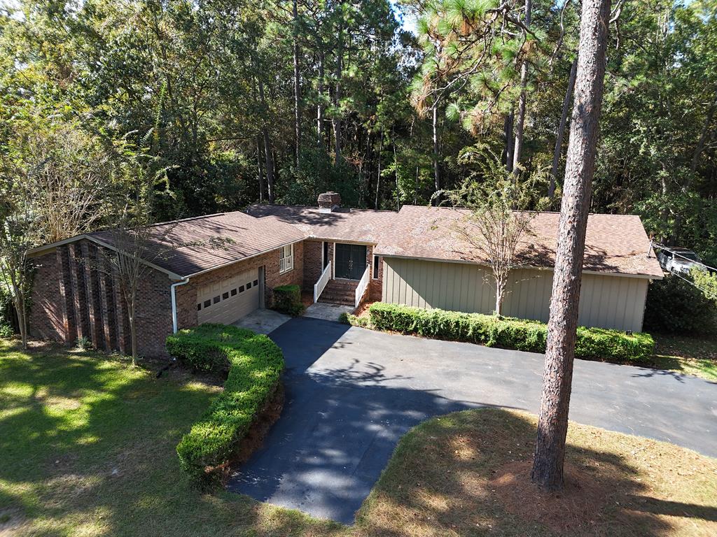 Location! Location! Location! Haven't heard that rule in a while! This home is just that, Located on south side of Thomasville, near Brookwood School. Features double door entryinto a foyer that leads to a charming 3 bedroom 2 bath home. Features are large kitchen, formal dining room, large den with fireplace, custom wood floors (seems to be a thing of the past) , french doors leading to a private wooded backyard. Nice brick patio for entertaining. Make a appointment soon, won'tlast long.