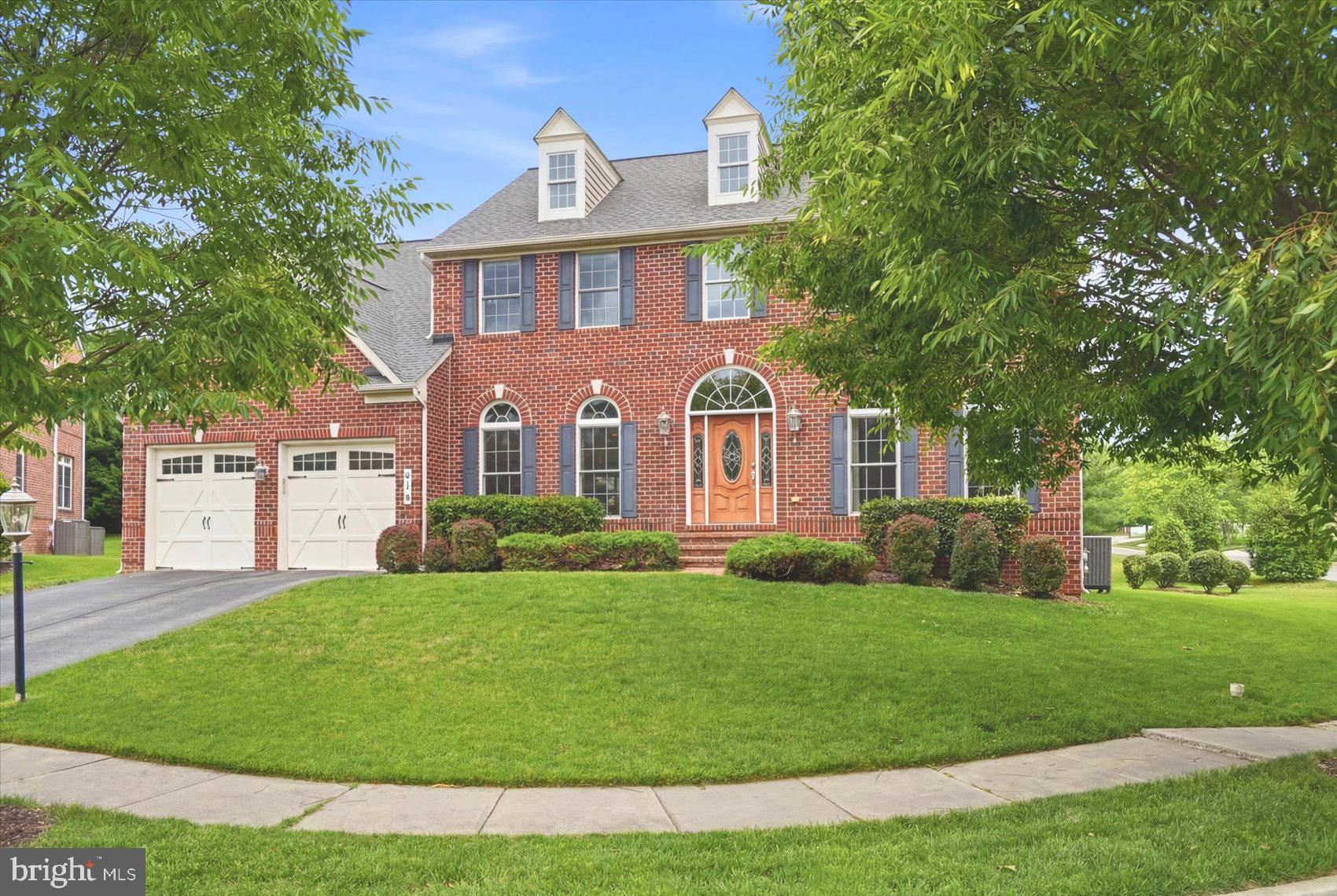 SPECTACULAR 5 Bedroom 5 Full Bath ALL BRICK Colonial in Woodholme Reserve on a Cul de Sac * Backs to wide open field * over 4400 square feet of living space above grade * New roof 2026 * HVAC system updated in 2023 * Expansive light filled living space with flexible layout for a large or multigenerational household * Palladian windows * GORGEOUS kitchen with an island, GRANITE countertops, backsplash, double oven, butler's pantry and breakfast room * The MAIN level family room has a GAS fireplace * Main level bedroom * FULL bath * STUNNING staircase to the upper level that offers a PRIMARY suite with a tray ceiling, sitting room, walk in closet & GAS fireplace as well as THREE additional bedrooms and 2 FULL baths * The LOWER level offers a second family room, game room with additional space for an office or guest room * Lower level walk up stairs * TWO car garage and EV charging ready * The LARGE greenspace in the rear can be used as an extension of the yard to enjoy time with your family * Invisible dog fence * Conveniently located close to shopping, restaurants and major arteries * This FABULOUS and well maintained has so much to offer!