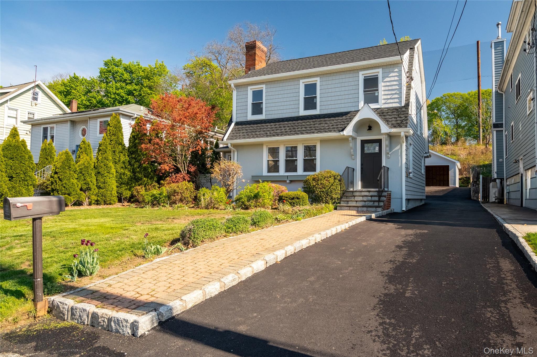 Beautifully reimagined for modern living while honoring its timeless character, this turnkey village charmer blends thoughtful renovation, elevated design, and everyday functionality in one compelling offering. Set on a level .15-acre property in the heart of Elmsford, this fully renovated 3-bedroom Colonial offers sun-filled interiors, refined finishes, and an effortless flow for both daily living and entertaining.A welcoming entry opens to beautifully updated living spaces where classic charm meets contemporary style. The renovated kitchen serves as the heart of the home, featuring tasteful finishes, modern touches, and an open connection to the main living areas. Spacious and light-filled rooms create a warm, inviting atmosphere, while updated baths add a polished, move-in-ready feel throughout. Upstairs, three well-proportioned bedrooms offer comfort and flexibility for guests, home office needs, or growing households.The home’s appeal extends outdoors with a private backyard setting ideal for dining al fresco, play, gardening, or simply unwinding. Every detail of the renovation has been curated to create a true turnkey experience—where character, comfort, and convenience come together seamlessly.Ideally located near village amenities, parks, shopping, restaurants, and major parkways for easy commuting, this is a rare opportunity to own a fully renovated home with style, substance, and lifestyle appeal in a sought-after Westchester setting. A sophisticated blend of classic 1929 charm and modern finishes, 26 Woodside Avenue delivers the kind of move-right-in living today’s buyers are searching for.