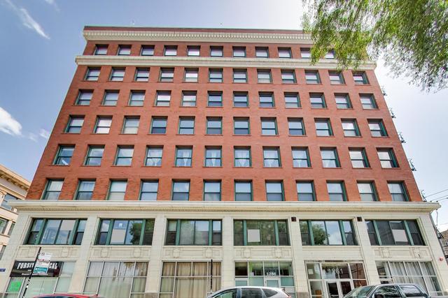 Live in style in this one-of-a-kind, sun-drenched loft in vibrant Wicker Park/Bucktown.  A private elevator opens directly into your unit, revealing over 2,200 square feet of living space that spans the entire 7th floor. Light floods in from huge east, west, and north-facing windows with beautiful skyline and sunset views. The extra-high 10-foot ceilings and massive living and dining areas give this place a truly special and expansive feel - perfect for entertaining. The extraordinarily spacious and bright master bedroom is highlighted by beautiful corner windows and an enormous walk-in closet. Shared full bathroom with double vanity. The second bedroom is a generous size with great closet space and its own full, detached bathroom. The third bedroom offers an easy layout, perfect for a multi-purpose room. Hardwood floors run throughout the main living areas, with painted concrete floors in the bedrooms. The large kitchen features 42" cabinets, granite countertops, and LG appliances. A separate laundry room with extra storage and central air complete the unit. Low assessments.  In this prime location, you can easily walk to all the vibrant restaurants, popular shops, and lively bars that make Wicker Park and Bucktown so desirable. With bustling Milwaukee Avenue at your feet and Division Street just two blocks south, you're at the heart of the action. The Blue Line is also a short walk away. Included in the sale is one year of prepaid exterior parking across the street on the corner of Paulina and Moorman.
