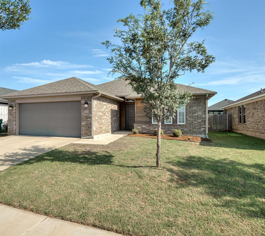 SELLER OFFERING 2-1 INTEREST RATE BUY DOWN WITH PEFERRED LENDER! This stunning contemporary style home comes with a nice-sized back patio overlooking a fully fenced yard! Inside lies an open concept layout with lovely wood-like tile flooring and carpet throughout the living space. The split plan allows distance between the primary suite and secondary beds/bath. The kitchen boasts stainlessappliances with a gas cook range, quartz counters, a breakfast bar, and 3 windows for that added natural light! The primary suite comes with double vanities, large walk-in closet, as well as a tile-surrounded soaking tub and stand-up shower! This home sits conveniently across the street from the community playground and splashpad, with the soccer field close by! Owner licensed.