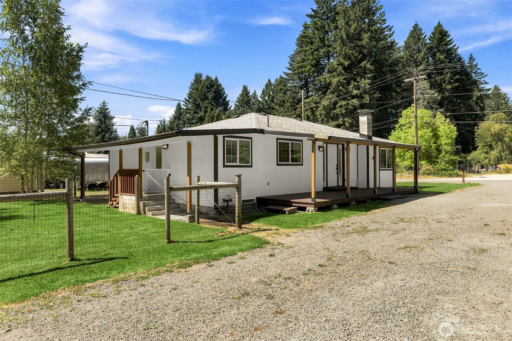 Updated 2-bedroom, 2-bath home in the heart of Randle offering comfort, convenience, and versatility. This well-maintained property features a functional layout, refreshed interior, and inviting living space ready for full-time living or a weekend retreat. Enjoy a fenced yard—perfect for pets, gatherings, or added privacy—plus a shop ideal for storage, hobbies, or workspace. Full RV hookups including waste line to septic, water, power. Close to everyday amenities including schools in the White Pass School District, local stores, and medical/dental services.    Outdoor recreation is just minutes away with access to hiking, fishing, hunting, and year-round adventure near Mount Rainier National Park, Mount St. Helens National Volcanic Monument, and Gifford Pinchot National Forest. The nearby Cowlitz River offers excellent fishing and scenic enjoyment.    This property is a great opportunity to own in a growing recreation area while staying connected to essential services.     -Home is on a shared well.