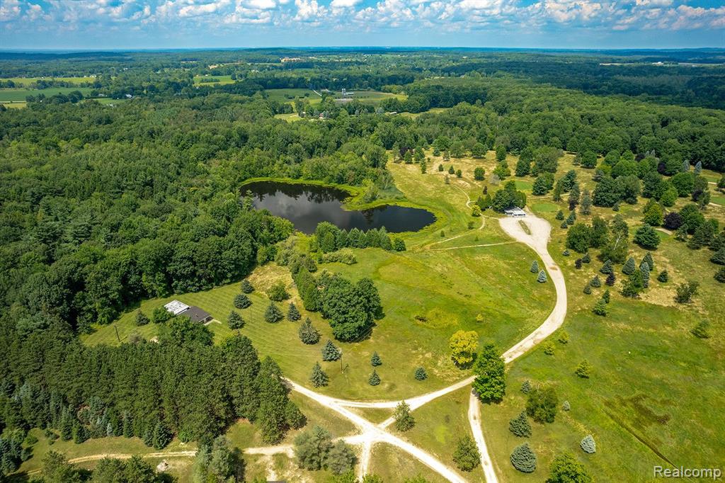 123+ Acres with a Lake, 2 Pole Barns, a Club House & a 2 bedroom/2 bath House (tenant is maintaining the property right now/will move out or stay). Comes with Liquor License!!!  Zoned RA - Commercial.  Land Contract Available!!! Previous 9 hole golf course For Sale!! Redevelop to your own OR Subdivision, Condo Complex...What do you dream of??  MAKE OFFER!