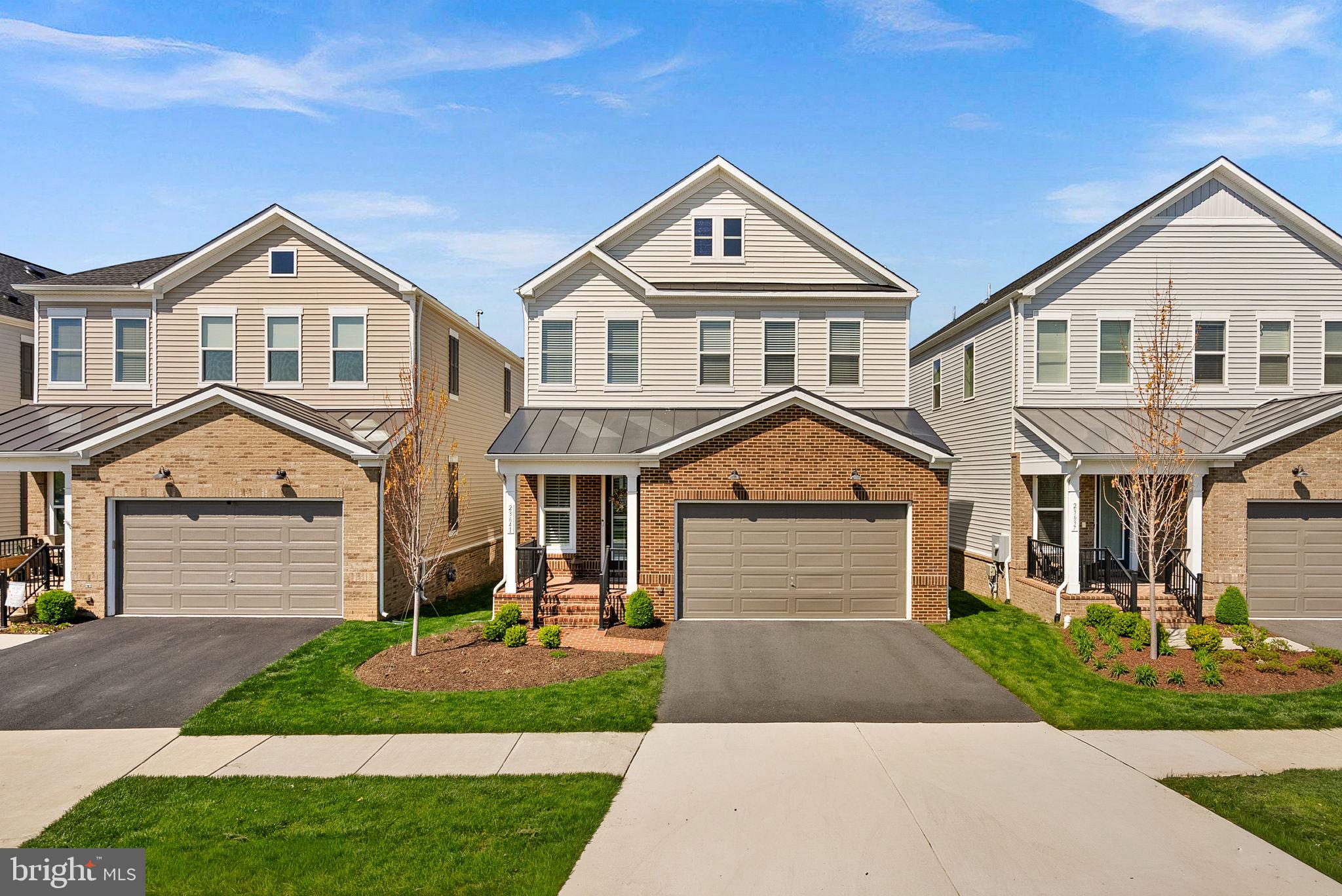 Discover the ease and elegance of low-maintenance living in this beautifully appointed 3-bedroom, 3.5-bath home built in 2022, offering approximately 2,900 finished square feet above grade in Birchwood at Brambleton, Loudoun County's premier active adult community. This thoughtfully designed 3-level home offers the convenience of main-level living with the flexibility of additional space above and below.The main level features a spacious primary suite with a spa-like bath and walk-in closet, an inviting living and dining area filled with natural light, and a gourmet kitchen with a large center island, perfect for everyday living and entertaining alike, all designed for effortless one-level living. Plantation shutters throughout the main level add a polished, custom touch. Upstairs, additional bedrooms and full baths offer the perfect setup for visiting family, guests, or a home office. There is a spacious covered balcony off the upper level, which adds extra outdoor living space. The lower level is unfinished, offering a blank canvas to create the space that fits your needs, whether that's a recreation room, home gym, additional living area, or simply valuable storage. A 2-car garage completes the home, providing convenient parking and extra storage.A recently installed fence completes the outdoor space.Enjoy resort-style amenities exclusive to Birchwood residents, including a clubhouse, fitness center, indoor and outdoor pools, tennis and pickleball courts, and a full calendar of social clubs and activities, all within a vibrant, active adult lifestyle community. Located minutes from Brambleton Town Center's shops, dining, and entertainment, with easy access to Route 50, Dulles Greenway, and Dulles International Airport.Low-maintenance living, exceptional amenities, and an unbeatable location — this is the lifestyle you've been waiting for! Welcome home!