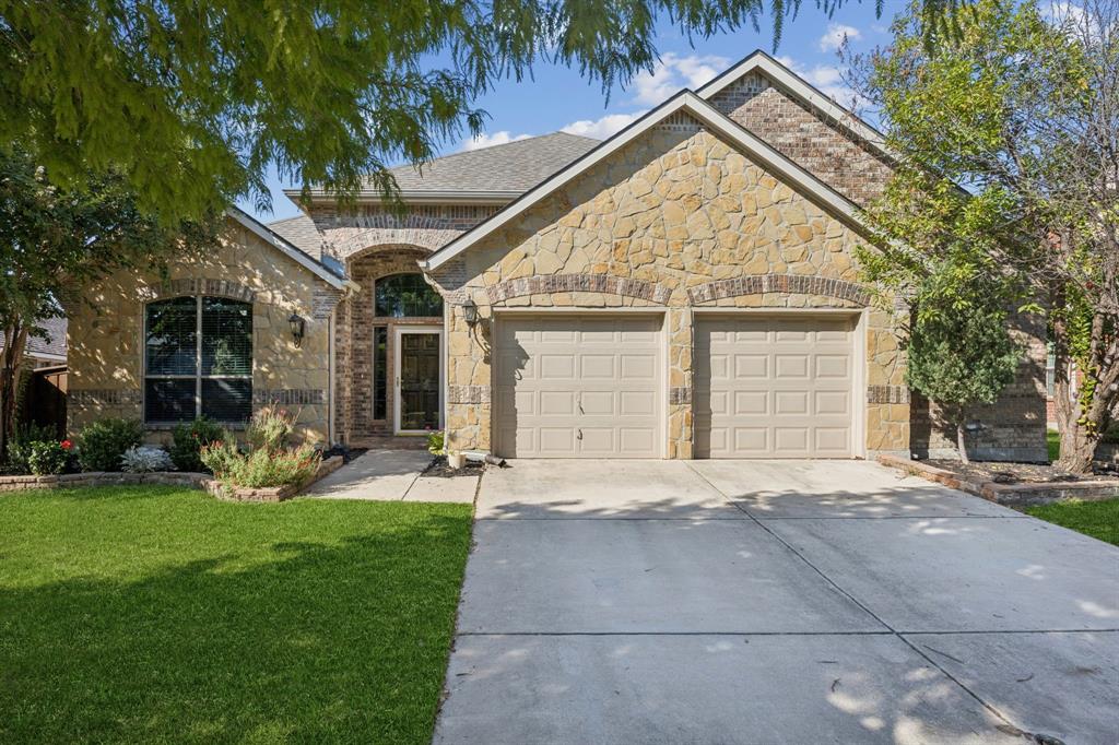 OPEN HOUSE SATURDAY 9.13 FROM 2-4PM! AMAZING, UNIQUE FLOORPLAN! OVER A QUARTER ACRE LOT WITH A HUGE BACKYARD! Brimming with curb appeal and framed by beautiful landscaping, this home is anything but ordinary. Inside, you’re greeted by soaring ceilings, recessed lighting, fresh paint, and wood-look floors that flow seamlessly throughout. Arched doorways, art niches, and thoughtful details add an elegant touch, while the open-concept layout makes the home perfect for everyday living and entertaining. The living room shines with a dramatic floor-to-ceiling stone fireplace, and the oversized kitchen is a chef’s dream with endless cabinetry, gleaming granite counters, and a stylish mix of black and stainless steel LG appliances.

The primary suite is a true retreat, featuring a vaulted ceiling with crown molding, a cozy bay window sitting area, dual vanities, an oversized walk-in closet, a garden tub, and a shower with a built-in bench. The split floorplan offers privacy for the 3 secondary bedrooms—one with a walk-in closet & French doors, that doubles perfectly as a home office.

This floorplan doesn’t stop there! Enjoy a sophisticated formal dining room elevated by tray ceilings, bay windows, new LVP flooring, and a dramatic sliding barn door entry. A central game room adds extra living space, while the oversized garage provides room for storage or a workshop. Modern perks like a tankless water heater add to the home’s appeal.

Step outside to a massive backyard with endless space for play or entertaining, all viewed from a spacious covered patio. The community itself is loaded with amenities—park, playground, basketball court, pool, and miles of trails—plus it’s all located near schools, shopping, and dining.