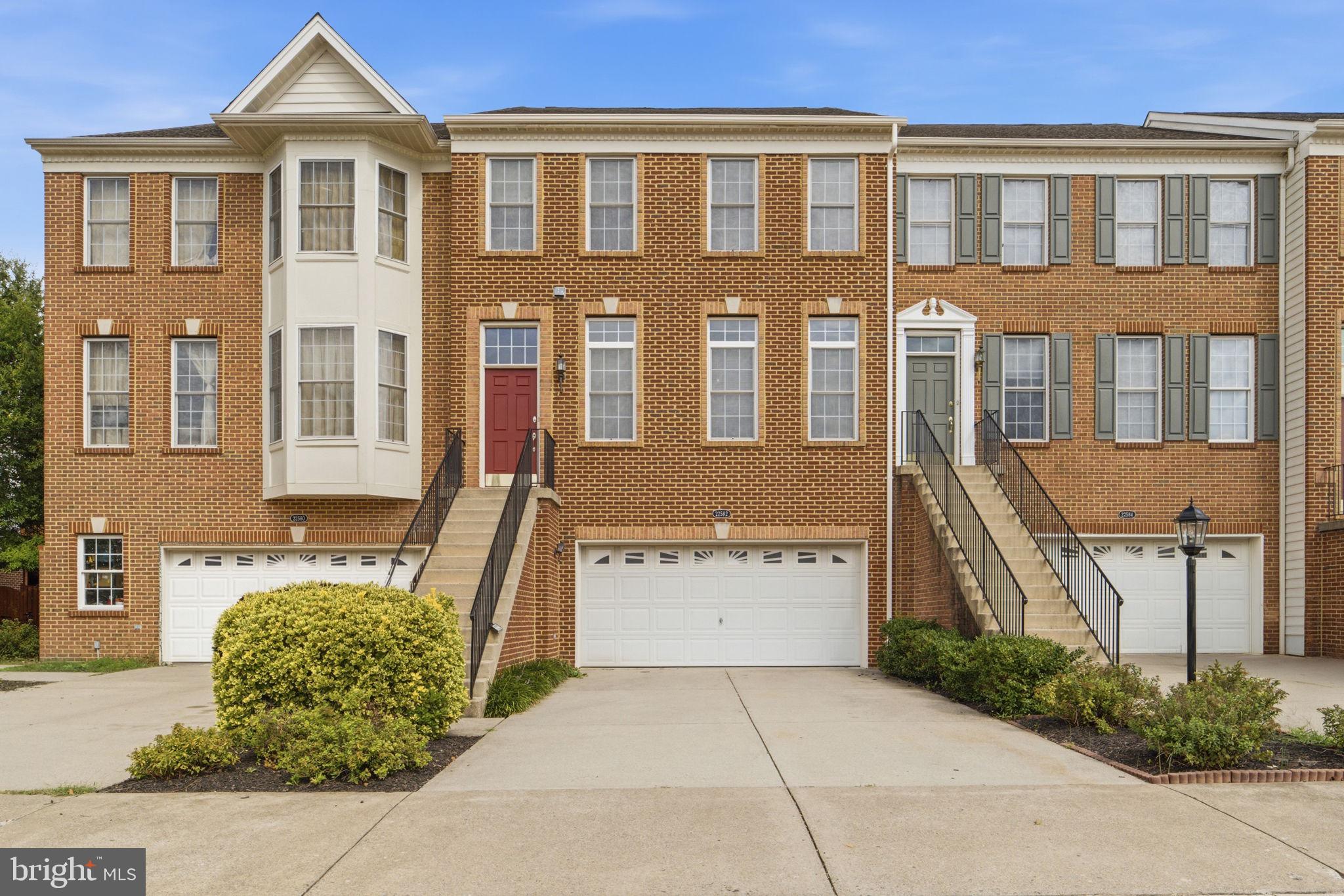 Absolutely. Here is a polished, **Bright MLS-friendly version** that keeps the important selling points while making it much easier to read and more compelling:**Gorgeous three-level brick townhome with a two-car garage in desirable Loudoun Valley Estates!** Ideally located just off the Dulles Greenway with easy access to Route 7, Loudoun County Parkway, Route 28 and Dulles International Airport. As you enter the community, you'll pass the neighborhood pool and enjoy the beautifully established setting of this conveniently located townhome community.The exterior staircase leads directly to the main level, making guest access especially convenient without having to navigate stairs from the lower level. The main level features beautiful hardwood floors, a powder room, spacious living and dining areas, and a generously sized family room with a fireplace overlooking the backyard. The open kitchen offers a center island, stainless steel refrigerator, gas cooking, wall oven, microwave and adjoining breakfast area with access to the rear yard backing to trees.The upper level features a spacious primary suite with cathedral ceiling, decorator shelf, large walk-in closet and luxurious bath with double vanities, soaking tub, separate shower and private water closet. Two additional generously sized bedrooms, both with cathedral ceilings and decorator shelves, share a hall bath. A conveniently located laundry room completes the upper level.The lower level offers a large recreation room, powder room and access to the two-car garage. The rear yard is relatively level and currently provides a blank canvas for landscaping, entertaining or creating your own outdoor retreat. The yard is fenced on both sides and could easily be enclosed completely, similar to neighboring properties.**Fantastic location, spacious floor plan, two-car garage, community pool and a beautiful wooded backdrop—this home offers exceptional convenience and flexibility in the heart of Ashburn!**