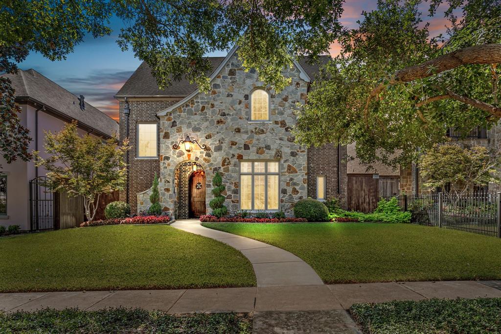 Welcome to 4725 Lafayette Avenue, a stunning 5-bedroom, 5.5-bath home offering 3,984 square feet of beautifully designed living space in the heart of Fort Worth’s 76107. This thoughtfully crafted residence combines elegance with functionality, featuring expansive living areas, soaring ceilings, and abundant natural light. The open-concept kitchen is a chef’s dream with premium appliances, custom cabinetry, and generous counter space, seamlessly flowing into the dining and living areas for effortless entertaining. The main staircase leads to three spacious bedrooms, each with its own full bathroom, while a secondary staircase offers access to a private bedroom and full bath—perfect for guests, an in-law suite, or a private retreat. The luxurious primary suite is located on the main level, designed with a spa-like bathroom and walk-in closet for ultimate comfort.
Step outside to a private backyard oasis, complete with a sparkling pool and a covered porch that’s perfect for relaxing or entertaining year-round.