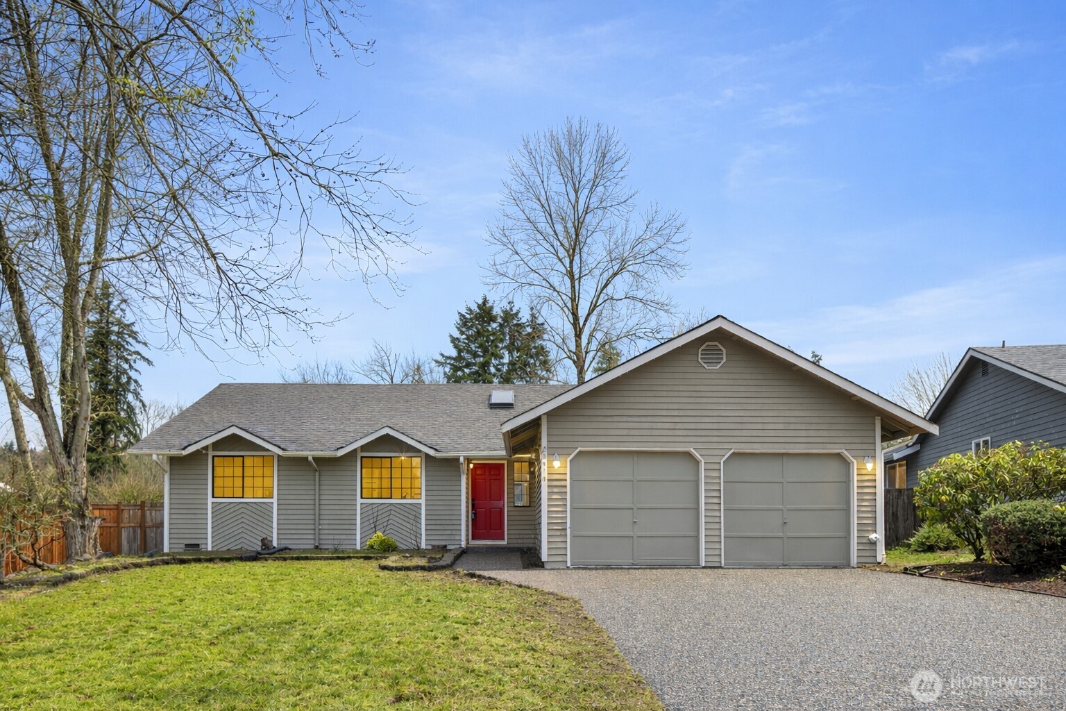 Located in the desirable Meadow Creek neighborhood, this charming 3-bedroom, 2-bath rambler offers a welcoming and comfortable lifestyle. The spacious living room, centered around a cozy fireplace, flows effortlessly into the dining area and kitchen, featuring oak cabinetry and quartz countertops. Skylights fill the home with abundant natural light, creating a bright and open feel throughout. The oversized primary bedroom provides a relaxing retreat. The home features copper plumbing and has seen several key improvements, including a new 30-year roof (2025), a new water heater (2025), a newer furnace (2021), and an updated electrical panel. Enjoy outdoor living in the fully fenced backyard with an expansive deck—perfect for summer BBQs and entertaining. A two-car garage and spacious driveway provide ample parking. The home backs to 60+ acres of Shelton View Forest, offering miles of wooded trails—perfect for hiking, biking, and year-round outdoor enjoyment. Close to Forsgren Park with soccer and baseball fields. Located within top-rated Northshore schools and conveniently close to I-405, SR-522, and I-5.