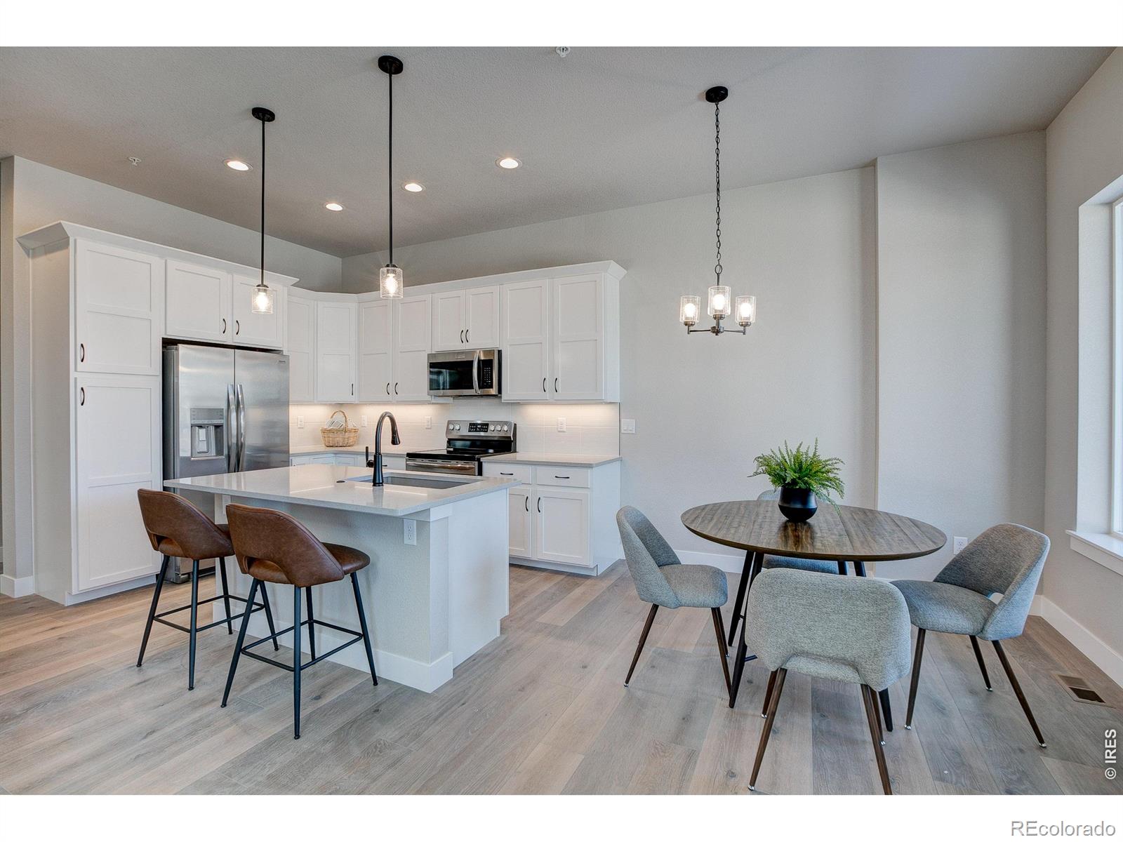 Quick move-in w/ special incentives! This beautiful townhome by Landmark Homes is located in Longmont, CO, at Highlands at Fox Hill. The Addison 2 offers 2,792 sf finished, 4 bed/3.5 bath, & 2-car attached garage. Craftsman exterior w/ fenced front porch, main-floor primary bedroom, oversized loft flex space & full FINISHED basement. Luxury finishes include quartz counters, upgraded painted cabinets, undercabinet lighting, stainless appliances, tile surrounds, tile floors in baths & laundry, tankless water heater & high-efficiency furnace. Low-maintenance lifestyle. Complimentary 1-year social membership to Fox Hill Country Club included. Minutes to Main Street Longmont, St. Vrain Greenway, Union Reservoir & Fox Hill Golf Course. Easy commute to Boulder. Ideal for first-time buyers, downsizers & investors. Personalized design process included. Pre-sale & move-in ready options available. Schedule your private tour & visit our model at 255 High Point Dr G #104, Longmont CO 80504. Quality TOWNHOMES (not condos) built by Landmark Homes, Northern Colorado's leading condo and townhome builder! Completion date may vary, call 970-682-7192 for construction updates.