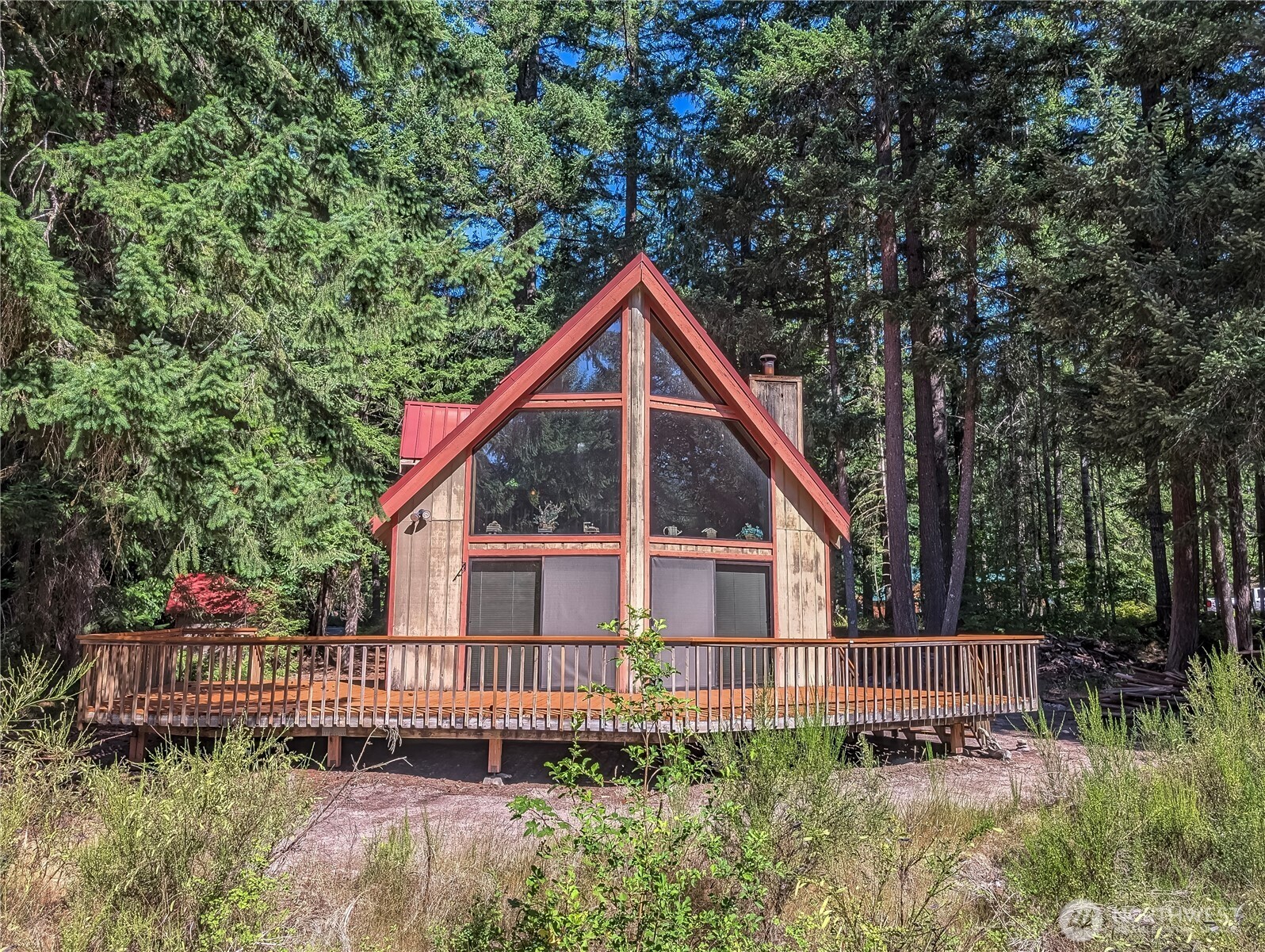 Riverside retreat on the Cowlitz! This 3BD/1.75BA, 1,526 sq ft home offers vaulted tongue-and-groove ceilings, exposed beams, wood stove, and open-concept living filled with natural light from large Milgard windows. Enjoy a newly replaced deck, metal roof, treed lot, and great southern exposure. Relax to the sound of the river or explore nearby skiing, hiking, and Gifford Pinchot Forest. High Valley amenities include golf, pool, water, and river access. Ideal as a full-time home, getaway, or STR. Seller offering $5K credit for upgrades—flooring, appliances, and more!