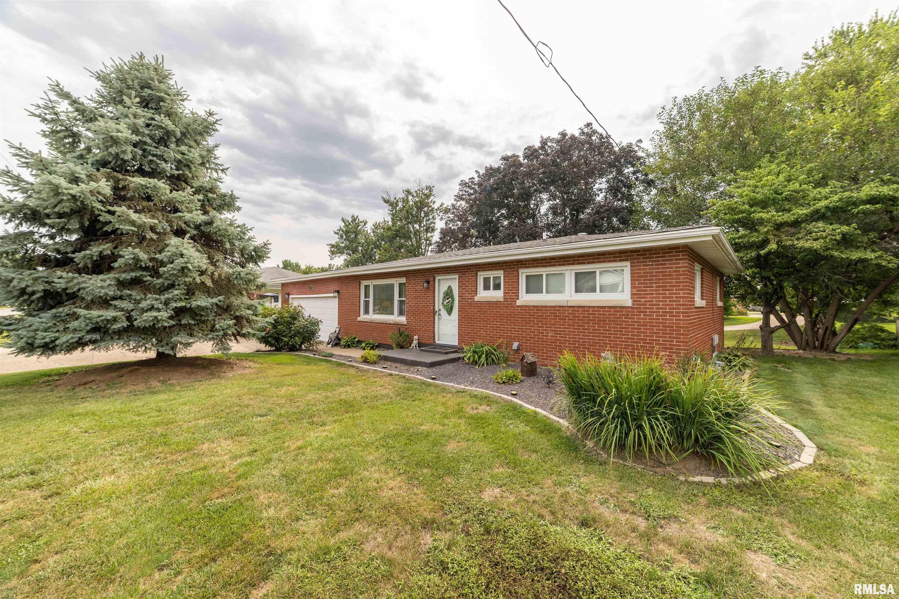 Move-in ready brick ranch in a desirable North Quincy location! This beautifully updated 2-bedroom home features an open floor plan that creates a bright, spacious feel, perfect for everyday living and entertaining. Originally a 3-bedroom home, the layout was thoughtfully redesigned by expanding one bedroom to create a generous main floor bathroom and convenient main-floor laundry, enhancing both comfort and functionality. The updated kitchen flows seamlessly into the main living area, while the remodeled bathroom and new flooring throughout give the home a fresh, modern look. The finished basement provides abundant additional living space, ideal for a family room, recreation area, home office, hobby space or additional bedroom. Enjoy your morning coffee or unwind in the inviting 3-season room or entertain guests on the backyard patio. A 2-car attached garage offers plenty of parking and storage. This well-maintained brick ranch offers the perfect combination of updates and space. Don't miss your opportunity to make this beautiful home yours!