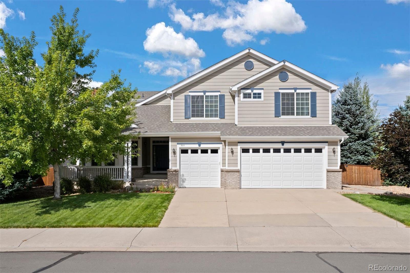 Set within the sought-after community of Sapphire Pointe, this spacious five-bedroom home with a private backyard, offers room to live with ease. Expansive windows invite natural light that warms every well-cared-for detail, while an updated kitchen and a rare main-floor primary suite create a lifestyle of comfort and refinement. Outdoor living completes the picture with an upper deck and lower patio overlooking open space—perfect for evenings that remind you why home matters.

Step into the grand entryway, where an 18-foot vaulted ceiling draws your eye to the outdoors through a wall of windows. Hardwood floors lead into the generous kitchen, where a large island with breakfast bar seating, ample prep space, pantry, and sunlit eat-in nook are complemented by luxury appliances, including a new KitchenAid double oven, microwave and Dishwasher with a JennAir refrigerator and cooktop. The open floor plan flows seamlessly into the great room, where a statement floor-to-ceiling stone fireplace serves as an anchor and art piece. The main-floor primary suite extends the ease of daily living with deck access, its own fireplace, and a spa-inspired ensuite with jetted soaking tub, walk-in shower, and walk-in closet. A dining area, office with French doors, and oversized laundry room with storage and access to the three-car garage complete the main level.

Up the spiral staircase, the upper level offers four bedrooms, two additional bathrooms—one Jack-and-Jill and one shared ensuite—and a second laundry. Whether hosting guests, creating space for play, wellness, or study, this level adapts with ease. Downstairs, an unfinished garden-level basement is ready to store or take on your next project—just one of the ways this home combines everyday comfort with future possibility. From morning coffee on the porch to sunset walks to the community’s parks, pool, and trails, Sapphire Pointe brings it all together.