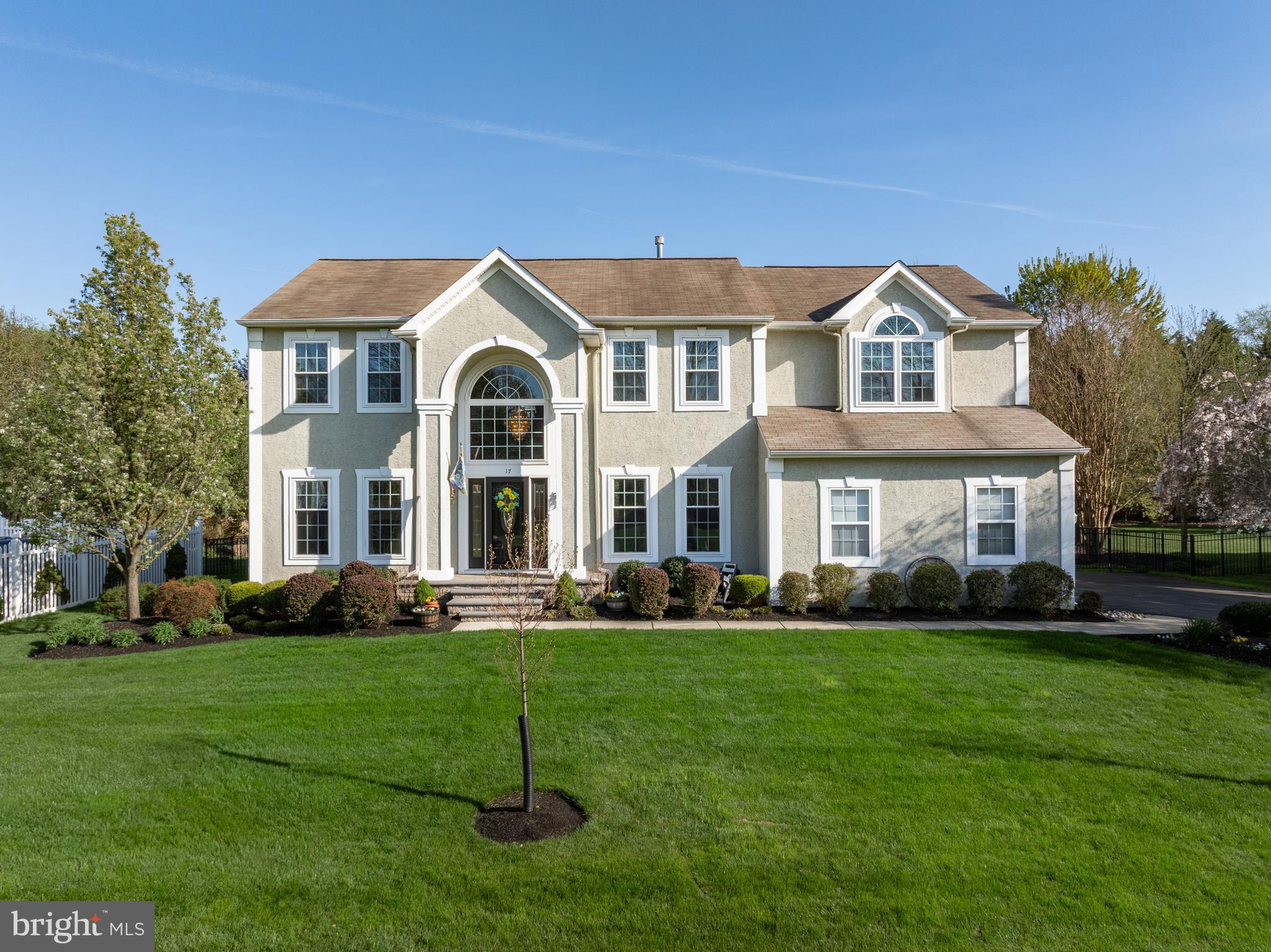 Impressive, pristine, and beautifully refined—welcome to 17 Chase Road in the sought-after Powells Mill community. This stunning Oxford Model offers the perfect blend of space, style, and everyday comfort with 4 bedrooms, 2.5 baths, and a thoughtfully designed layout that truly lives the way today’s buyers want.From the moment you enter, you’re greeted by gleaming hardwood floors and soaring cathedral ceilings that create an airy, light-filled atmosphere throughout the main level. A beautifully sized formal living room provides the perfect space to gather or unwind, while the elegant dining room—complete with access to a convenient butler’s pantry—flows effortlessly into the gorgeous kitchen, making entertaining seamless and sophisticated.The expansive great room is truly the showstopper, featuring a stunning fireplace, dramatic cathedral ceilings, and a striking visual of the elegant second-floor catwalk above—adding both architectural interest and an open, grand feel to the space. This area flows seamlessly into the kitchen, creating the ultimate setting for both entertaining and everyday living. Just off this space, a generously sized private office offers the perfect work-from-home setup or flex space.Upstairs, retreat to the oversized primary suite featuring an updated ensuite bath—your own private sanctuary. Three additional generously sized bedrooms and a full bath complete the second level, providing plenty of space for family, guests, or hobbies.Step outside and enjoy the expansive backyard, complete with a beautiful deck and retractable awning—perfect for relaxing, entertaining, or enjoying warm summer days in comfort and style.Meticulously maintained and move-in ready, this Powells Mill beauty offers the lifestyle, location, and layout buyers have been waiting for.This is more than just a home—it’s where your next chapter begins.