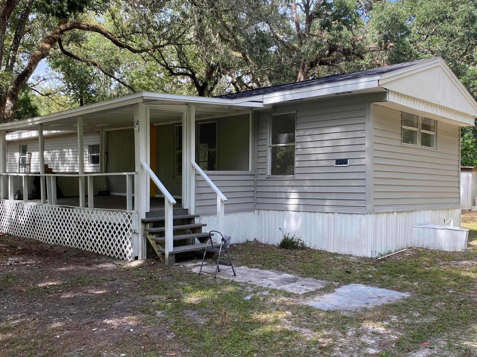 Welcome to your move-in ready retreat on nearly 1 acre of owned land in Brooksville. This 1980 HUD-code manufactured home (no lot rent) was fully renovated in 2025: new roof (including structural work), all new plumbing (supply & drain), brand-new appliances, new kitchen cabinets with dark stone countertops and backsplash, and two updated bathrooms with new ceramic tile. Efficient 2 bed / 2 bath (~784 sq ft living) with a smart layout, fresh finishes, and a big usable lot (˜39,180 sq ft) that gives you elbow room for boats, trailers, garden, or future improvements (verify with county). Peaceful street, easy access to the best of Brooksville and major corridors.
If you’ve been hunting for a clean, turnkey manufactured home with land included, this one checks the boxes—updated systems, modern style, and space to breathe. Bring your best proposal and start enjoying Florida living on day one. Land owned.