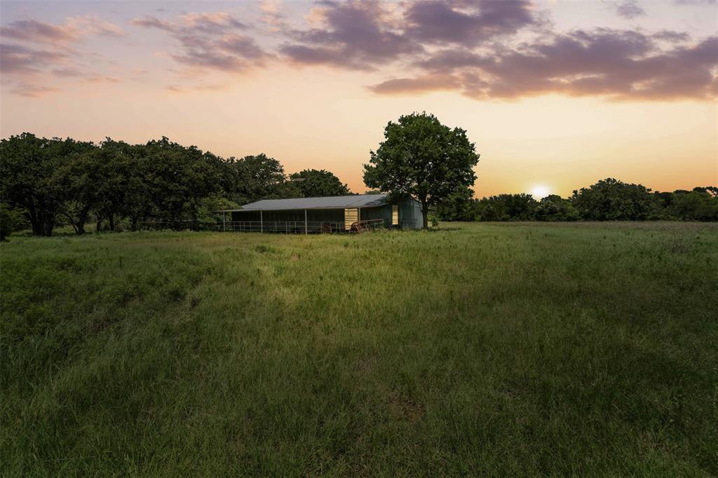 This is an amazing opportunity to own 78 beautiful acres in Palo Pinto County, just one hour west of Fort Worth. This expansive tract offers limitless potential for any vision and offers breathtaking views that provide a picturesque backdrop for your future home or weekend getaway. Includes electricity, AG exemption, cattle pens, a 30’x60’ pole barn, and great soil. Approximately a quarter of a mile of Barton Creek runs through the east side of the ranch, attracting an ABUNDANCE of wildlife and making it ideal for hunting or nature watching. There is a pond, perfect for fishing or enjoying the serene surroundings. This property features dense cover with massive oak trees transitioning to 30+ acre pasture with coastal grass, making it highly suitable for any livestock operation. It is fenced and cross-fenced with barbed wire, ensuring the security of your investment. Located just 2 miles from downtown Gordon and minutes from state parks, Lake Possum Kingdom, and Lake Palo Pinto. Whether you are looking for a weekend getaway, a hunting and fishing retreat, or a place to build your dream home, this ranch offers it all. This is a great investment that allows you and your family to create outdoor memories while your investment appreciates. The seller is a licensed Texas Realtor.