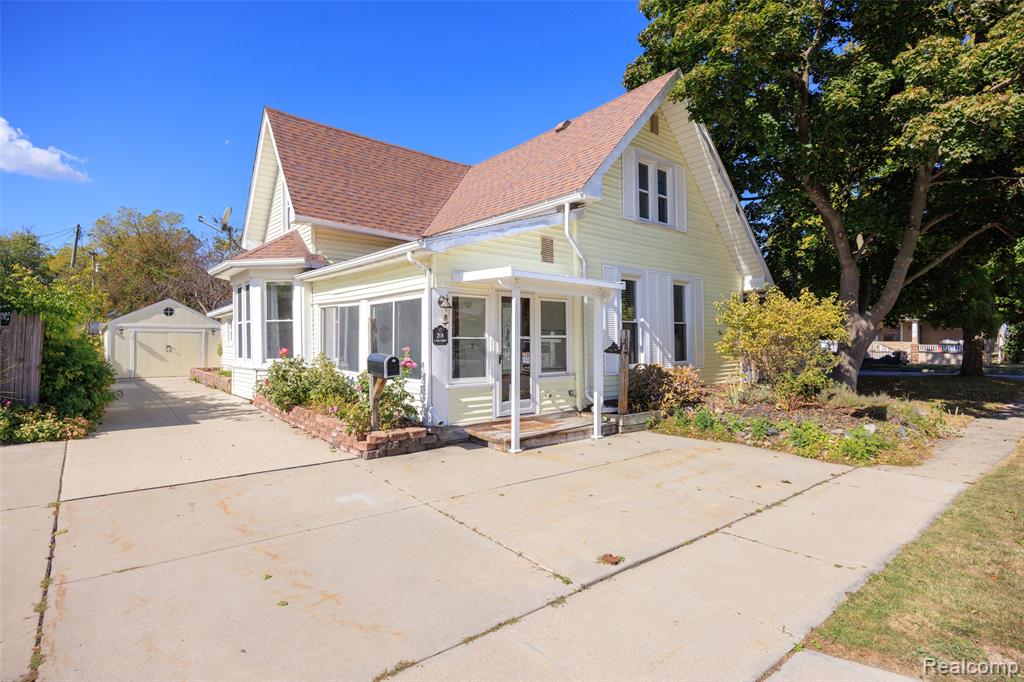 This adorable, updated 3 bedroom, 2 bath home is perfectly situated within walking distance to St. Clair's vibrant downtown....enjoy easy access to restaurants, shopping, and the beautiful boardwalk! Featuring two kitchens (one on the main level and one upstairs), this home offers flexible living arrangements and could potentially be used as a duplex. A spacious deck overlooking the fenced backyard, and a cozy three season room that could double as a mudroom. The upper level also offers a private balcony and exterior entrance, perfect for guests or multi-generational living! A great opportunity full of charm and versatility in the heart of St. Clair!