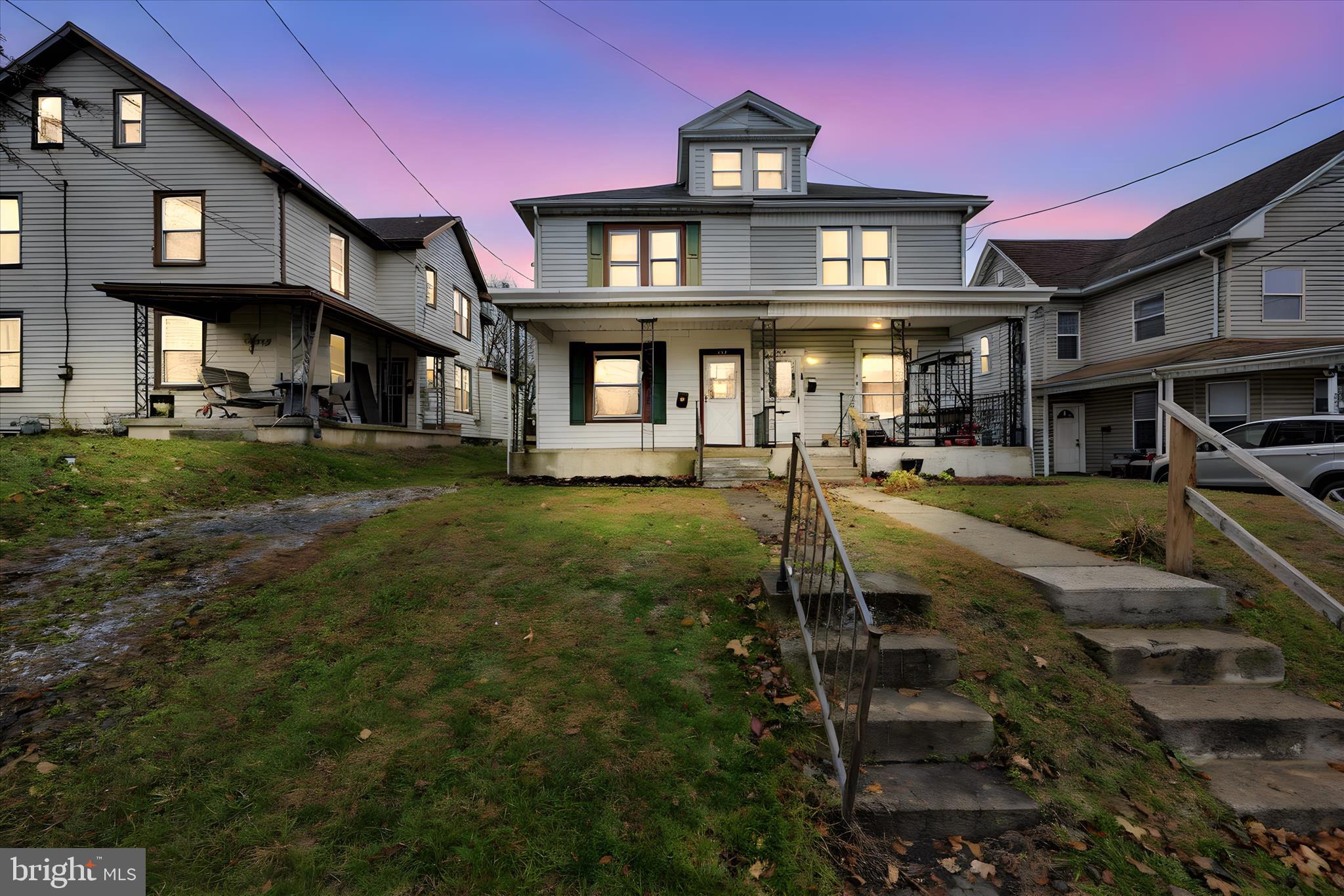 Located in East Pennsboro School District, this 3-bedroom, 1-bathroom semi-detached home offers approximately 1,436 square feet of interior space on a 0.08-acre lot. The main level features a living room, dining area, kitchen, and a first-floor laundry room. Upstairs includes three bedrooms and one full bathroom. Heating is provided by baseboard radiators. A covered front porch, backyard space, and storage shed are also present on the property. Updates completed include removal of knob and tube wiring. Public water and sewer. Being sold as-is.