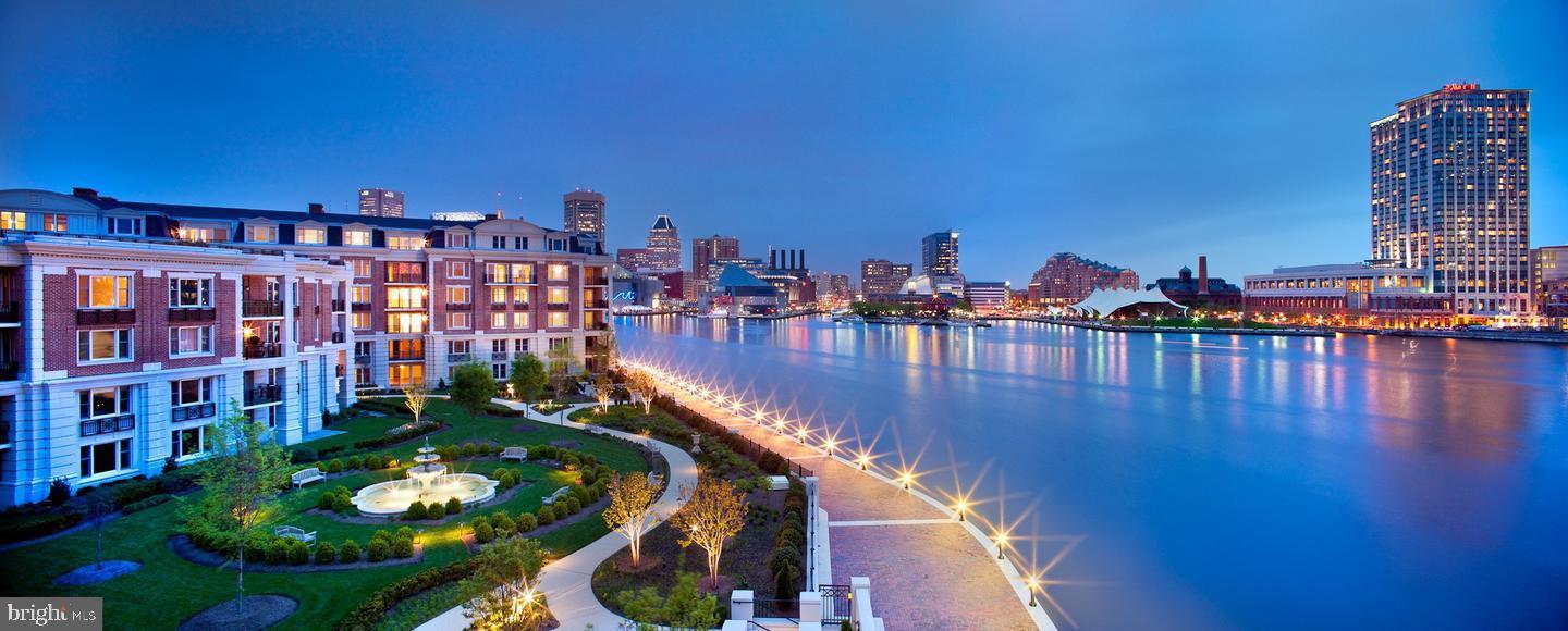 Experience Elevated Waterfront Luxury at The Ritz-Carlton ResidencesWelcome to unparalleled elegance in this stunning 2,136 square feet 2-bedroom, 2.5-bathroom waterfront residence at The Ritz-Carlton Residences, Baltimore's premier luxury address. As you step through your private vestibule, accessed via a semi-private elevator, you are greeted by a bright and sophisticated foyer leading to expansive living spaces. The generous layout is highlighted by rich wood floors, designer built-ins, and an inviting fireplace, creating a perfect setting for both entertainment and relaxation.The chef’s kitchen is a culinary masterpiece, featuring top-of-the-line Viking stainless steel appliances, granite countertops, a custom tile backsplash, and a convenient pot filler. Retreat to the luxurious primary majestic suite, with a sizable walk-in closet, and a spa-like en-suite bath with dual vanities, a deep soaking tub, and a large walk-in shower to mention but a few.Step outside to your private balcony, a tranquil oasis perfect for savoring stunning sunsets and enjoying the serene waterfront setting.Enjoy a wealth of five-star amenities, including 24/7 concierge and valet services, a heated saltwater indoor pool, a state-of-the-art fitness center, a theater room, a residents' lounge, and a game room. Additional perks include access to a dedicated boardroom, beautifully landscaped gardens, six guest suites, and a luxurious spa.With its prime location adjacent to the Inner Harbor and close to Federal Hill Park, this residence offers not just a home, but a lifestyle of sophistication and convenience. Don’t miss your chance to lease this extraordinary waterfront gem. Schedule your private showing today and experience the epitome of luxurious urban living. Welcome to the Ritz. Welcome home!