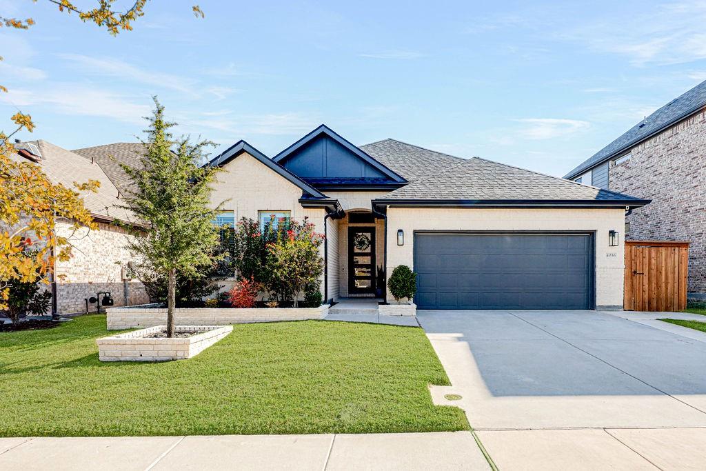 Welcome to this beautifully designed K. Hovnanian home featuring 4 bedrooms, 3 full bathrooms, a thoughtfully crafted open-concept layout that connects the main living spaces, perfect for both everyday living and effortless entertaining. Inside, you’ll find a Level 3 interior upgrade package, showcasing elevated finishes and modern touches throughout. Step outside to discover exterior enhancements, including a climate-controlled garage with AC, an extended driveway for added convenience, a gated trash can pad, and custom exterior planter beds designed with matching brick. The home is further enhanced with custom Jellyfish lighting, creating stunning curb appeal day and night. Situated in the desirable Sage neighborhood within the highly sought-after Light Farms community, residents enjoy access to an array of amenities, including pools, scenic parks, miles of trails, and a fully equipped fitness center. This home truly has it all, comfort, style, and an unbeatable community. Welcome home.