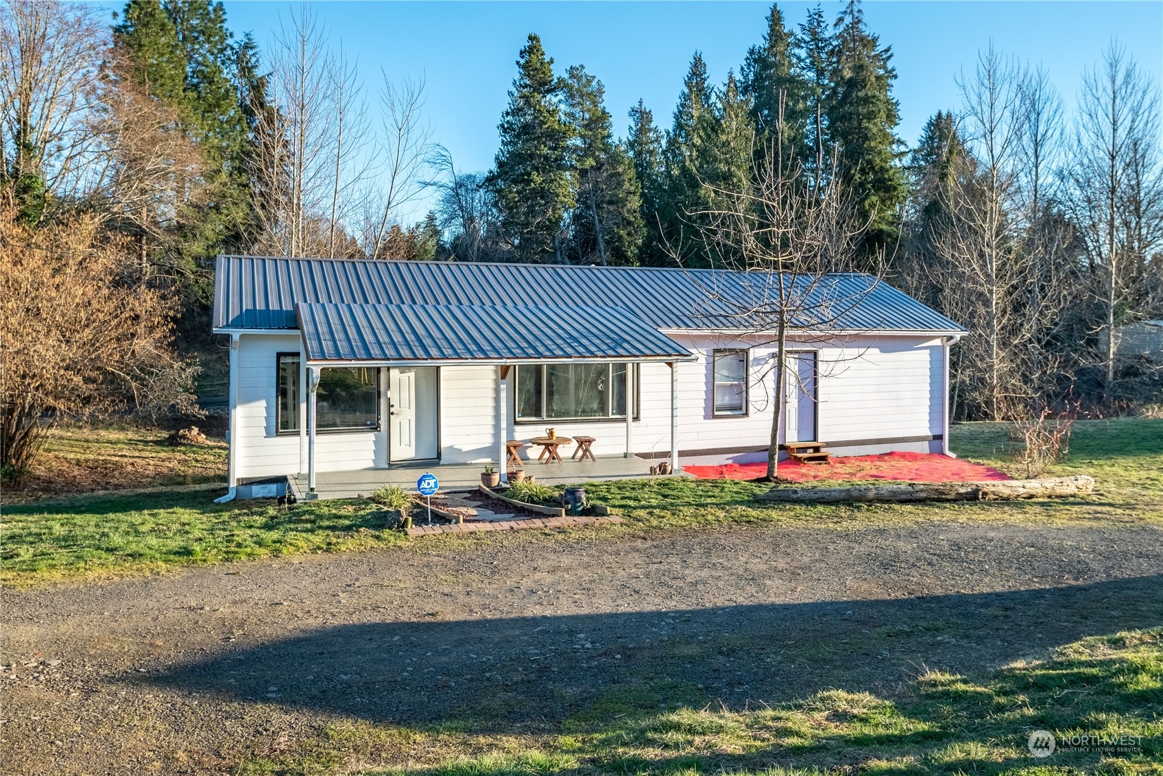 Adorable updated 2bd/1 bth with a spacious laundry room on a .56 ac lot.  Featuring a metal roof, hardy board siding, a new septic and a crawl space large enough to store bikes, outdoor toys etc.... The home also has a creek on the lower back of the property and a large yard for gardening or activities. This property is conveniently located near local amenities. Call your favorite agent and schedule a showing today!!