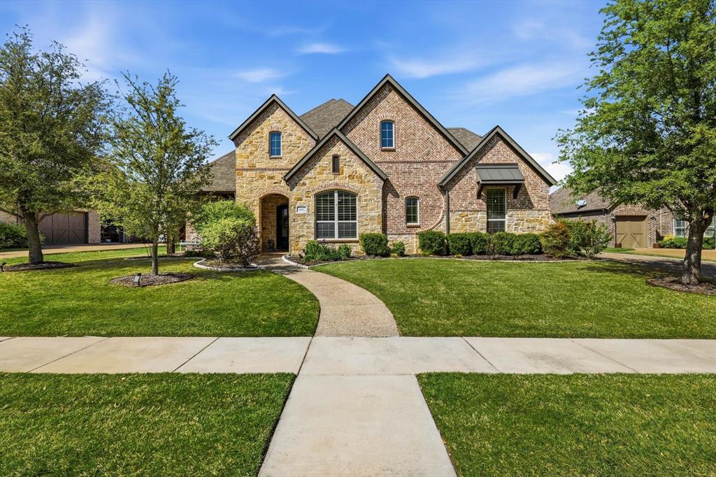 COME HOME TO THIS BEAUTY! Within the highly desirable CANTERBURY HILLS ESTATES Subdivision located within Trophy Club! Rare NEXT GEN OR IN-LAW SUITE upstairs complete with living area, its own kitchenette, bedroom and bath. Features include, covered front porch, DOWNSTAIRS MEDIA ROOM, triple crown molding, hardwood floors, gorgeous granite countertops, high end double ovens with six burner stove, beautiful gas stone fireplace (stone extends to the ceiling), Sono's sound system, water softener system, wine cooler, split bedrooms with private primary suite. Spa like primary bathroom with huge shower, double vanities, separate bathtub, and bidet. Additional features include, nice size office, jack and jill bedrooms downstairs, gorgeous lighting, auto roman shades, plantation shutters, mosquito mix system - (mist 3 times a day-cost $4k), google nest, water softener, coffee bar with cabinets. Home has lots of storage. Oversized THREE CAR GARAGE with epoxy floors - plenty of room for your cars and toys! Enjoy entertaining friends and family in the private resort style backyard or just chill after a hard day of work. The gorgeous pool has a waterfall, tanning ledge and fire feature! The jacuzzi is covered with a pergola. Check out the large, covered patio! Vacations will have to top this! There are too many features to list all of them here! Roof and water heater are 2 years old, pool pump replaced last summer. Trophy Club offers unbelievable amenities including access to fishing, golf, jogging and hiking trails - trails are 10 miles around lake Grapevine (less than a mile away), tennis courts and park. In addition, Trophy Club has its own shopping area complete with grocery store, restaurants and other retail. This home is minutes from Hwy 114 - a major highway that feeds into others leading to both Dallas and Fort Worth. There are conveniences all around. Minutes to Southlake Town Center (upper end shopping), Hawaiian Falls Waterpark and DFW Airport. DON'T MISS THIS ONE!