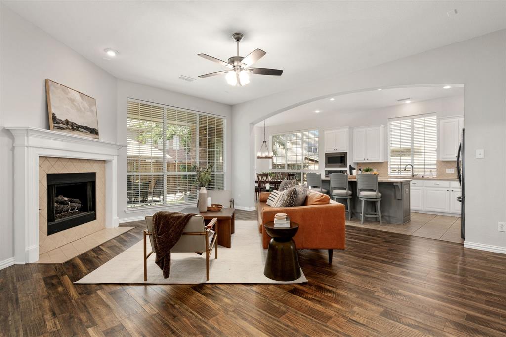 This is the one you've been looking for - a move in ready home at a great value offering the perfect balance of comfort, convenience, and lifestyle. Thoughtfully updated home in the amenity-rich community of Woodbridge offering a comfortable and functional floor plan designed for everyday living and entertaining. The heart of the home features an inviting open-concept layout with seamless connectivity between the living room, eat-in kitchen, and breakfast nook. Anchored by a cozy gas fireplace, the living area opens to a covered back patio overlooking a private backyard surrounded by cedar fencing and mature trees. All bedrooms are conveniently located downstairs, along with a spacious dedicated office and formal dining room connected to the kitchen for effortless hosting. The generously sized primary suite is filled with natural light and features a relaxing, fully renovated spa-inspired ensuite bath. Upstairs, enjoy a massive game room, designated media room, and supportive full bathroom perfect for entertaining or multi-functional living. Extensive updates include new HVAC systems, newer roof, new flooring throughout, fresh interior paint, updated lighting, newer appliances, renovated primary bathroom, and more. Residents enjoy walkable access to numerous parks, playgrounds, green spaces, community pools, and splash pad, plus expansive walking, running, and biking trails throughout the neighborhood. Conveniently located just a short golf cart ride from the clubhouse and golf course with easy access to shopping, dining, entertainment, and major highways for an effortless commute. Come to a look!