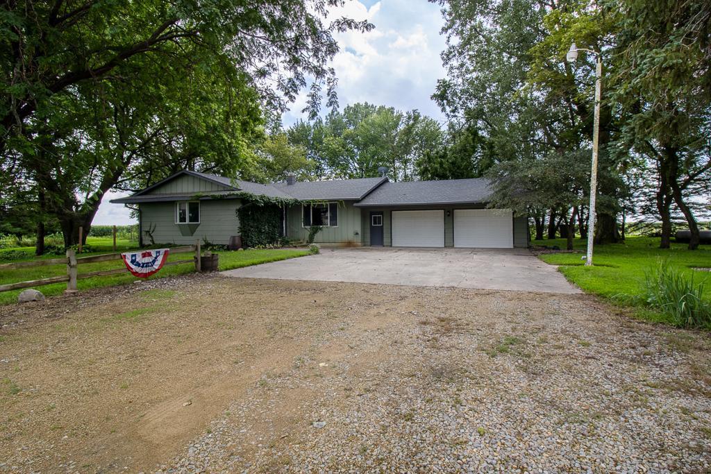 Charming 5-Acre Hobby Farm with Spacious Home and Versatile Outbuildings Welcome to your perfect country retreat! This well maintained 4-bedroom, 2-bath rambler is set on a serene 5-acre hobby farm, offering the ideal blend of comfort, functionality, and rural charm. The property includes several outbuildings, highlighted by a massive 40' x 62' pole shed—perfect for storage, livestock, or your next big project. Inside, the main floor features a thoughtfully designed layout beginning with a welcoming entryway. The spacious living room flows effortlessly into the open kitchen and dining area, where you’ll find ample cabinetry and counter space, stainless steel appliances, a breakfast bar, garage access, and a convenient pass-through to the spectacular Great Room. The Great Room truly lives up to its name, boasting vaulted ceilings, skylights, tiled floors, floor-to-ceiling windows, a cozy wood stove with a brick surround, and a built-in wet bar—perfect for entertaining or relaxing in style. One of the four bedrooms is currently used as a main-floor laundry, offering flexibility to suit your lifestyle. The main floor also features an updated full bath with a custom walk-in shower.
Downstairs, the finished lower level offers even more space with a large recreation room, a 3/4 bath, an additional bedroom, multiple storage areas, and a versatile flex room ready to adapt to your needs. Whether you're dreaming of a small-scale farm, extra room for hobbies, or simply more space to spread out, this property has it all. Don’t miss this rare opportunity to enjoy peaceful country living with unmatched versatility!