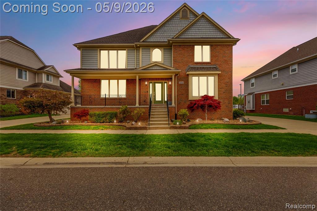 This 4 bedroom, 4.5 bath home has two Master Bedrooms! One on the first floor with a door wall that opens to the backyard patio, and a second Master upstairs with its own private balcony and two walk-in closets. On the main level you have a two story foyer, grand staircase, two-story great room, dedicated office, and a large kitchen and dining area with a door wall to the side patio.First floor laundry, a finished basement with a full kitchen and bathroom, freshly painted throughout, and a 2 year old AC. Attached garage with an oversized driveway. Located in the Utica Community School district.