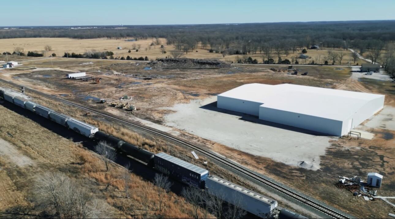 COMMERCIAL RAIL PROPERTY-CPKC RAIL ACCESS- CLASS 1 RAILWAY~INDEPENDENTLY OWNED RAIL SPUR WITH 2 SWITCHES, 45 CAR CAPACITY & CAR MOVING WINCH~OPPORTUNITY ZONE & FOREIGN TRADE ZONE~LOCATED ON HWY 59 NEAR NEOSHO AIRPORT~EASY ACCESS TO I-49 & 22 MILES TO I-44~40,000 SQ FT WAREHOUSE, FULLY RENOVATED IN 2021 WITH 100% CONCRETE FLOOR, 1 DOCK DOOR WITH LEVELER, 3 DRIVE-IN BAYS WITH 14'X16' GARAGE DOORS, 24' SIDE WALL HEIGHT, 2 WALK IN DOORS WITH RESTROOMS AND OFFICE AREA POTENTIAL~25+/- ACRES WITH NO KNOWN RESTRICTIONS~50,000 SQ FT PAD READY TO BUILD ON~3 PHASE POWER IN 2 SEPARATE AREAS~SEMI TRUCK SCALES ON SITE~LARGE WATER WELL WITH 3 PHASE PUMP~ANOTHER WELL & 2 SEPTICS~1,344 SQ FT OFFICE BUILDING OR RESIDENCE~FIBER INTERNET~CENTRALLY LOCATED IN THE MIDDLE OF THE US